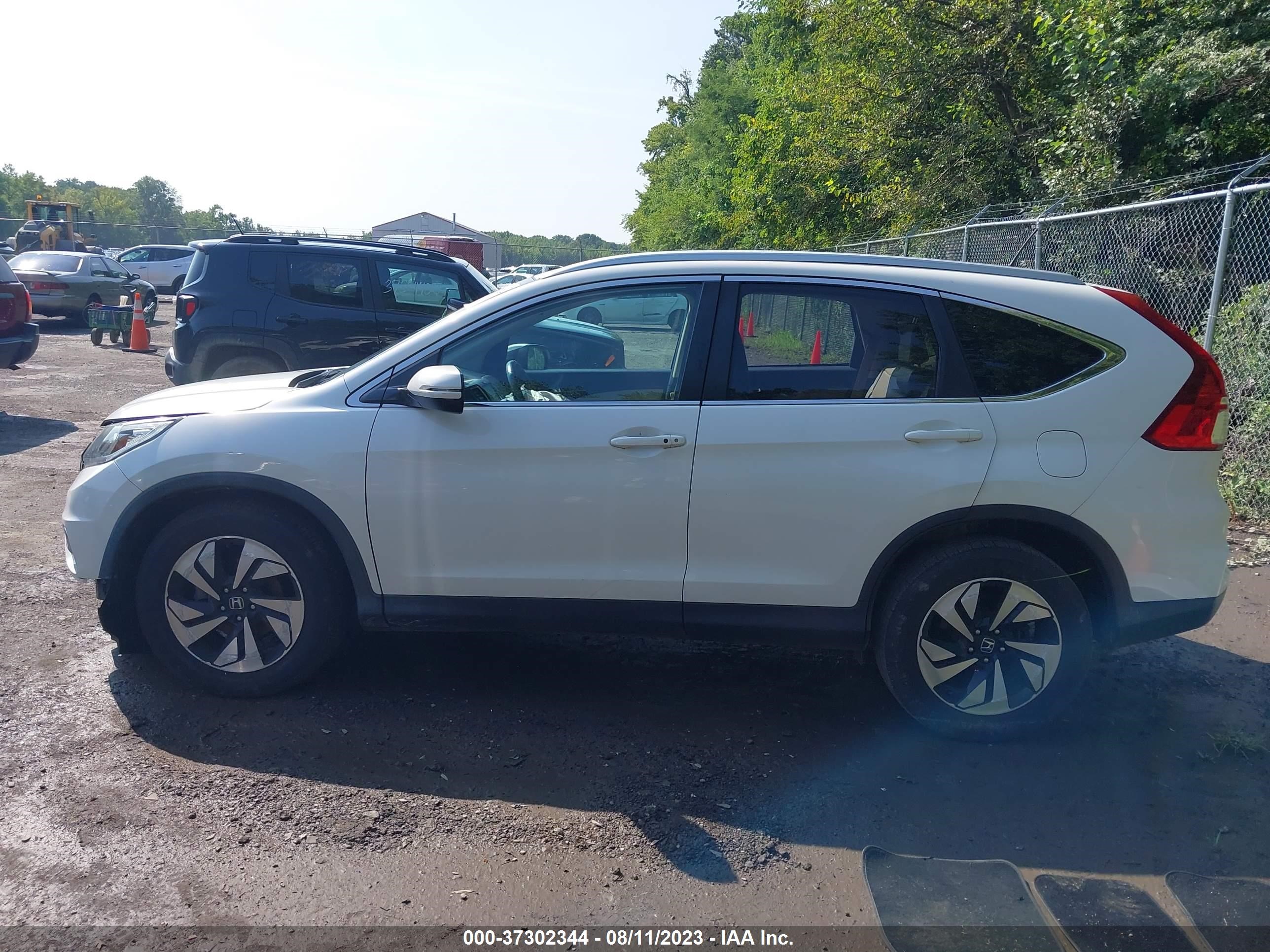 Photo 13 VIN: 5J6RM4H97GL075156 - HONDA CR-V 