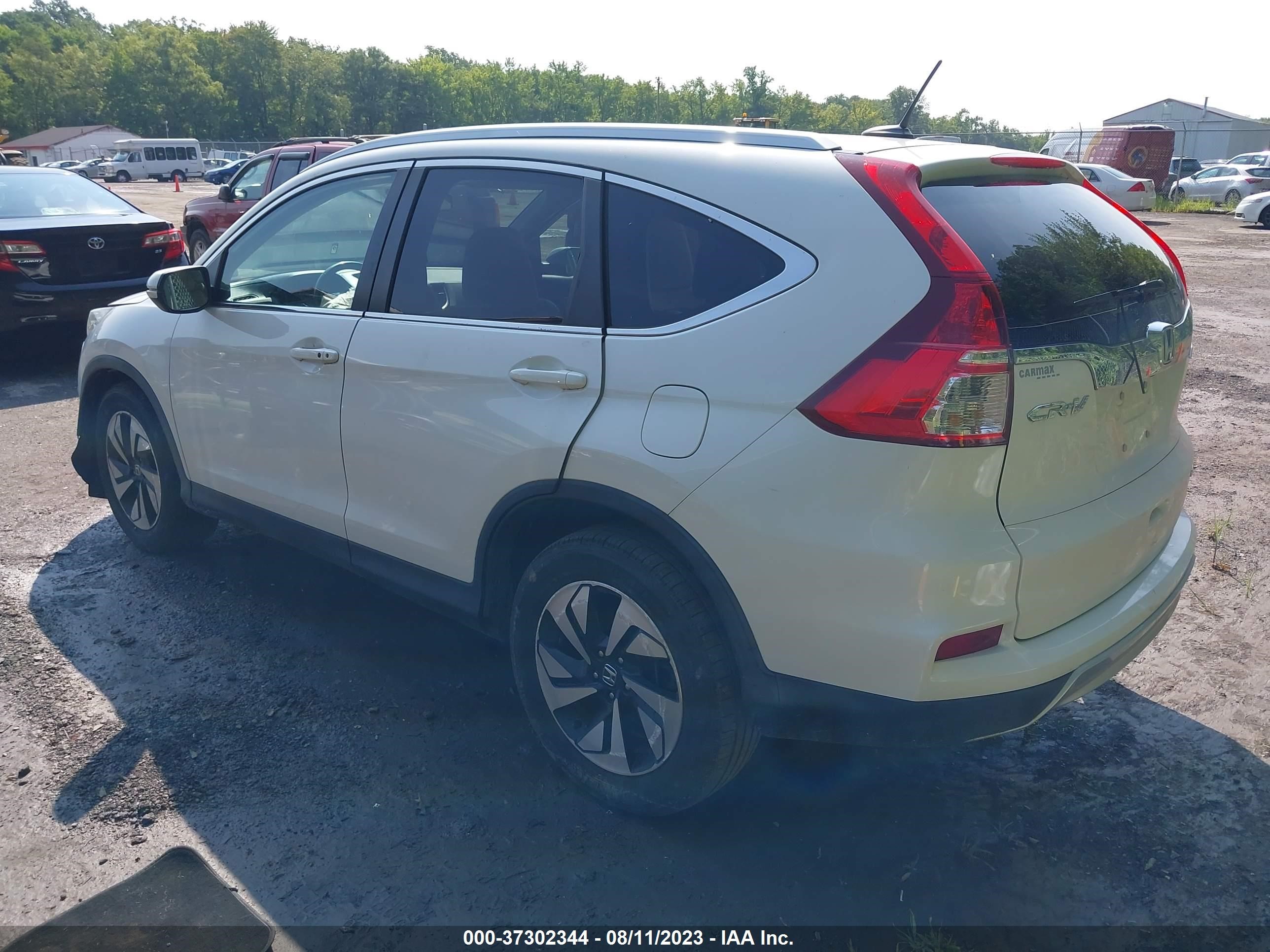 Photo 2 VIN: 5J6RM4H97GL075156 - HONDA CR-V 