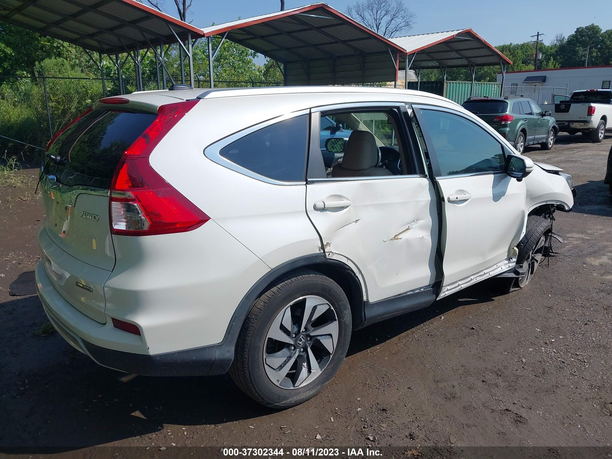 Photo 3 VIN: 5J6RM4H97GL075156 - HONDA CR-V 