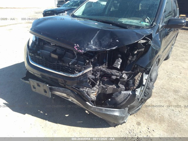 Photo 5 VIN: 5J6RM4H9XGL052938 - HONDA CR-V 