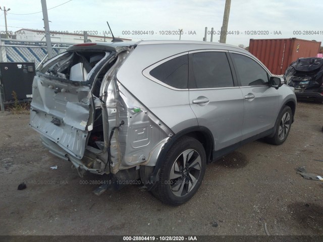 Photo 3 VIN: 5J6RM4H9XGL087866 - HONDA CR-V 