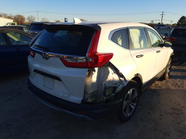 Photo 3 VIN: 5J6RW5H3XHL004417 - HONDA CR-V LX 