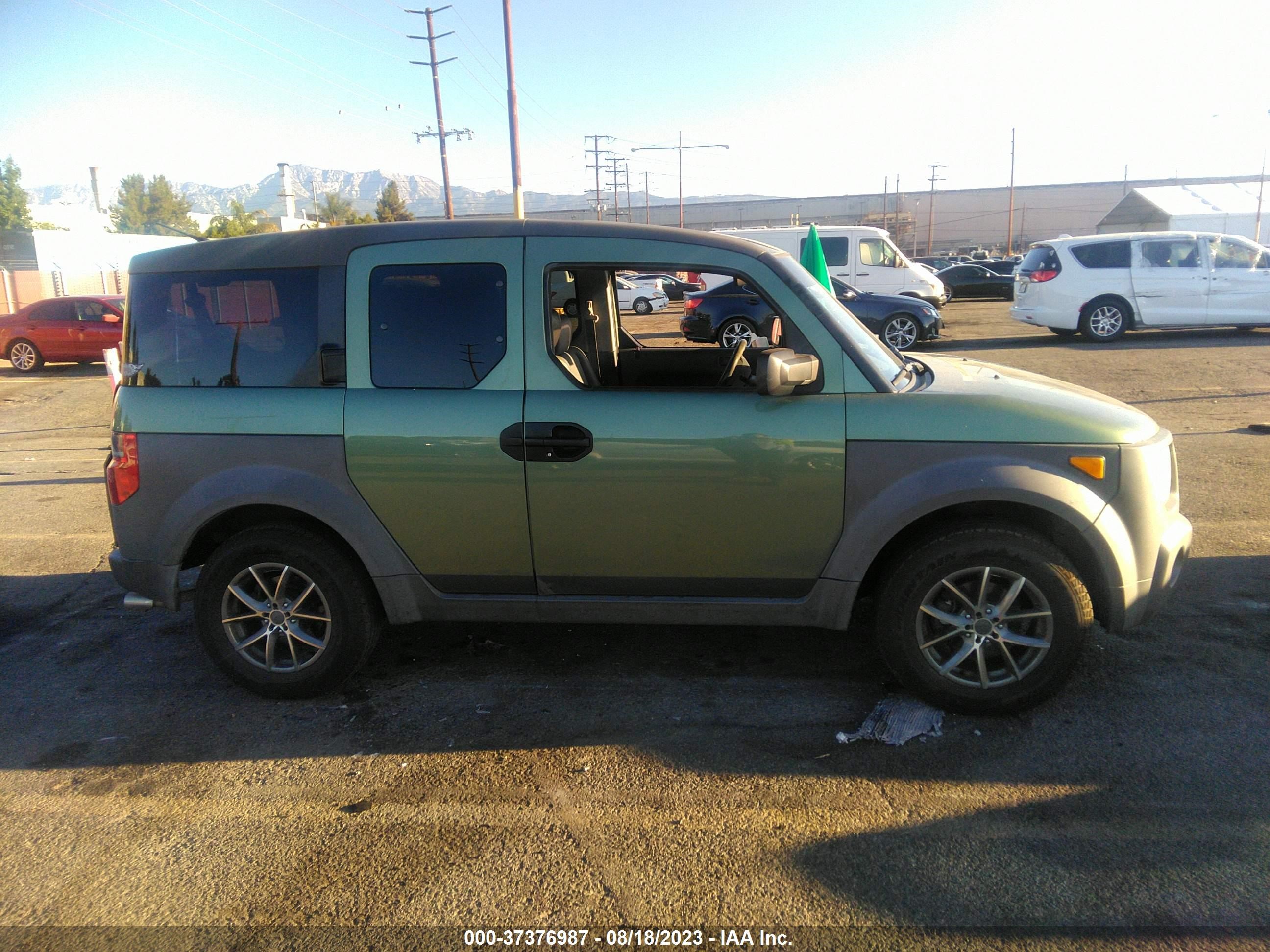 Photo 12 VIN: 5J6YH18534L004964 - HONDA ELEMENT 