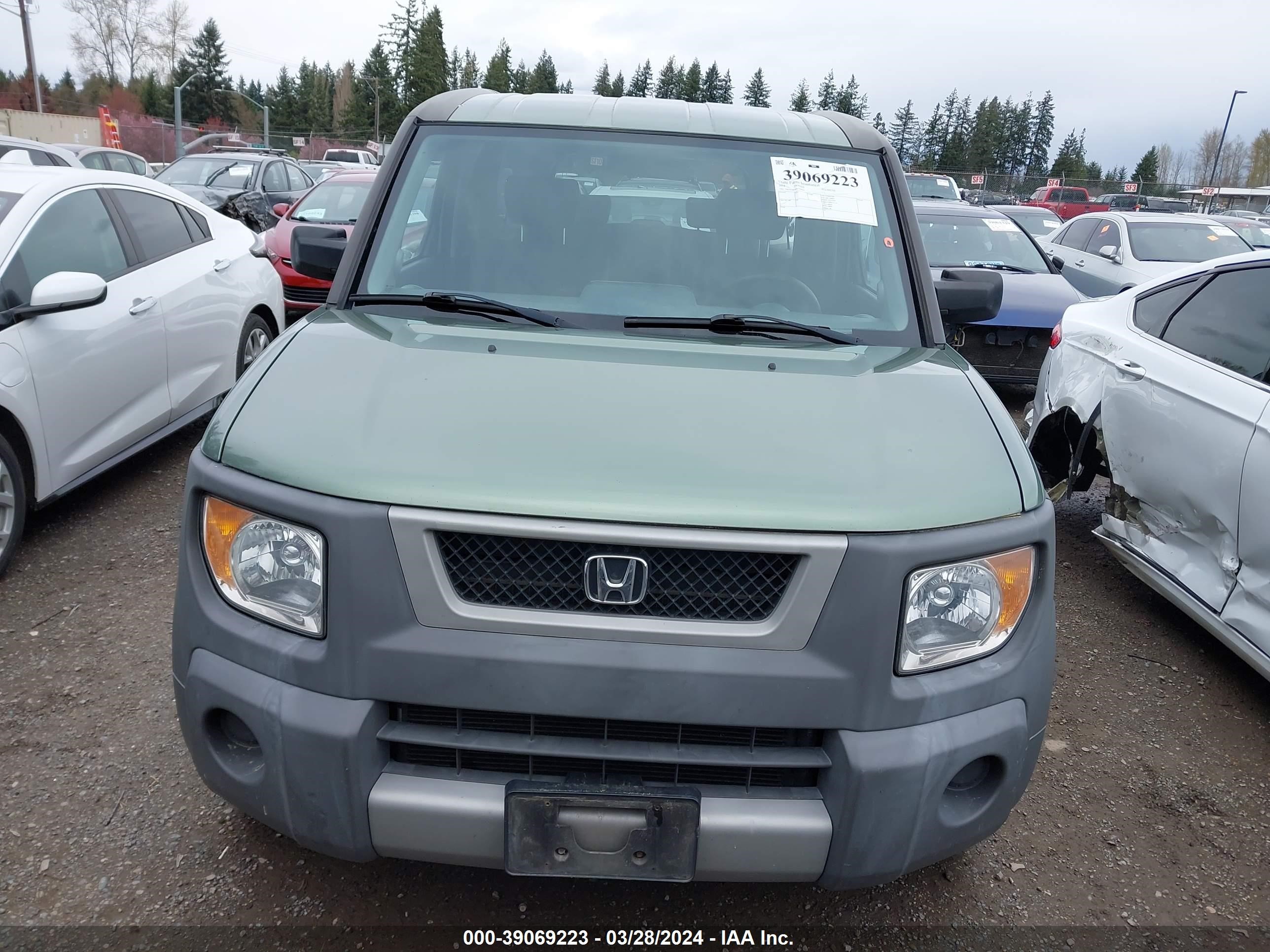 Photo 11 VIN: 5J6YH28544L018927 - HONDA ELEMENT 