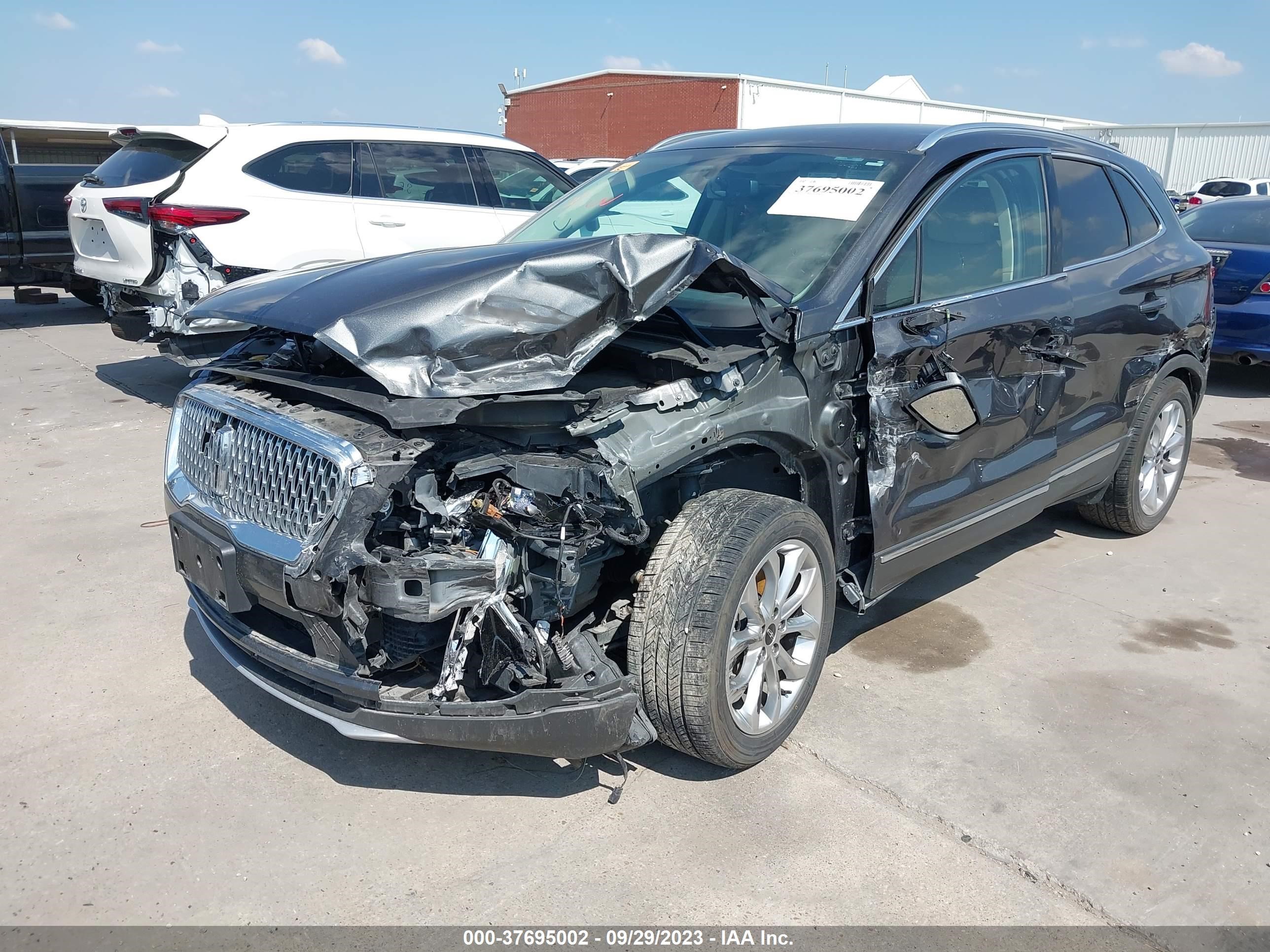 Photo 5 VIN: 5LMCJ2C91KUL37734 - LINCOLN MKC 