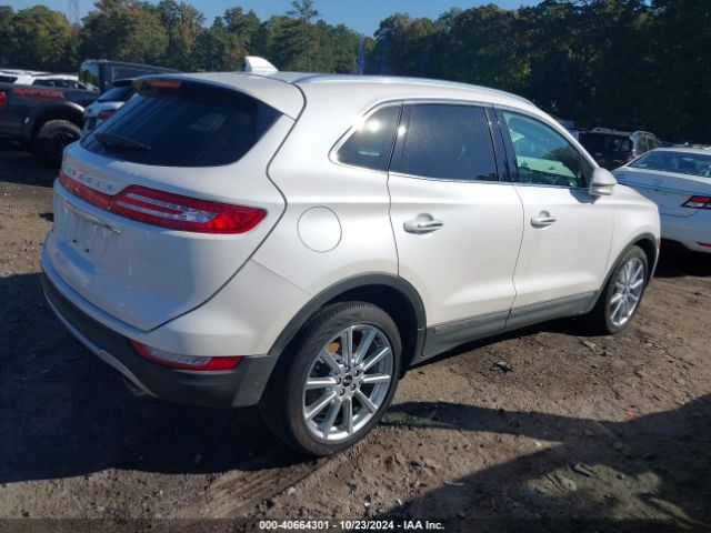 Photo 3 VIN: 5LMCJ3C96KUL25374 - LINCOLN MKC 