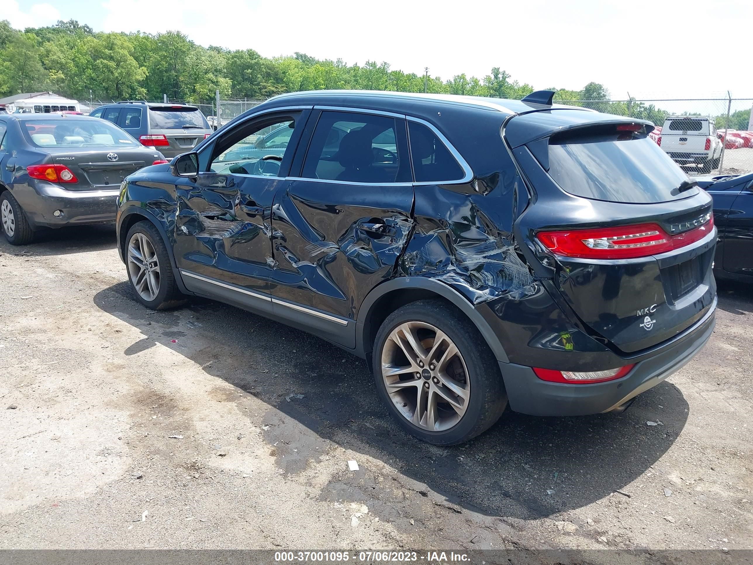 Photo 2 VIN: 5LMCJ3D91GUJ20843 - LINCOLN MKC 