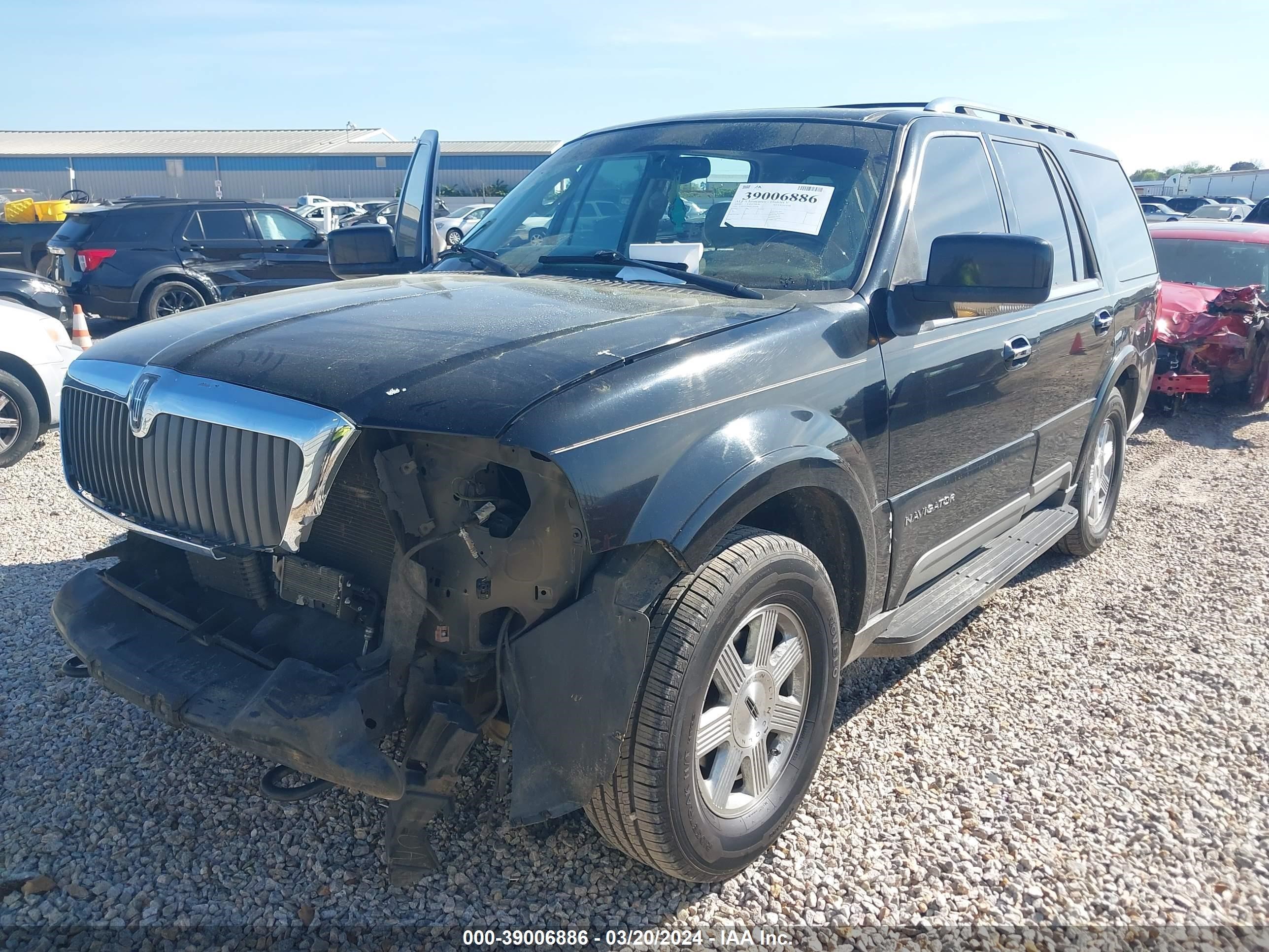 Photo 1 VIN: 5LMFU27R94LJ27972 - LINCOLN NAVIGATOR 