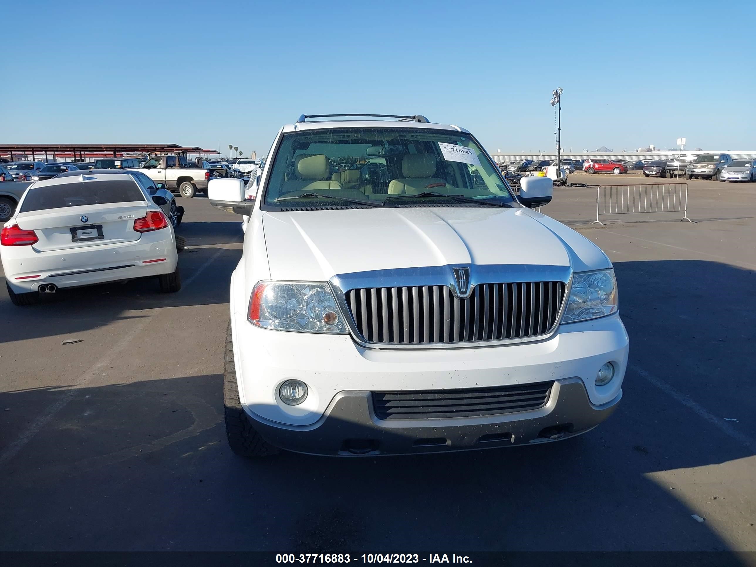 Photo 11 VIN: 5LMFU27RX4LJ16592 - LINCOLN NAVIGATOR 