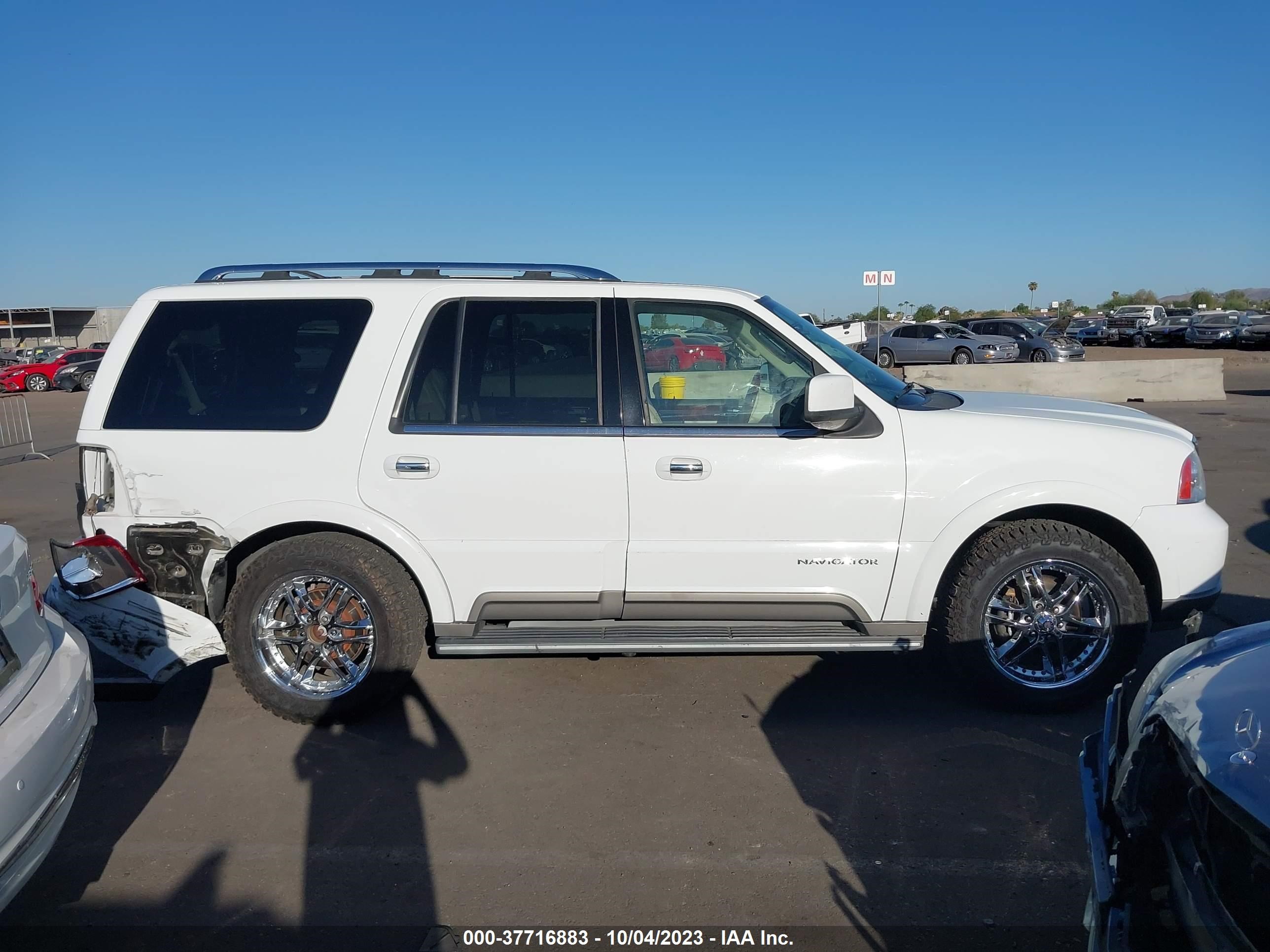 Photo 12 VIN: 5LMFU27RX4LJ16592 - LINCOLN NAVIGATOR 