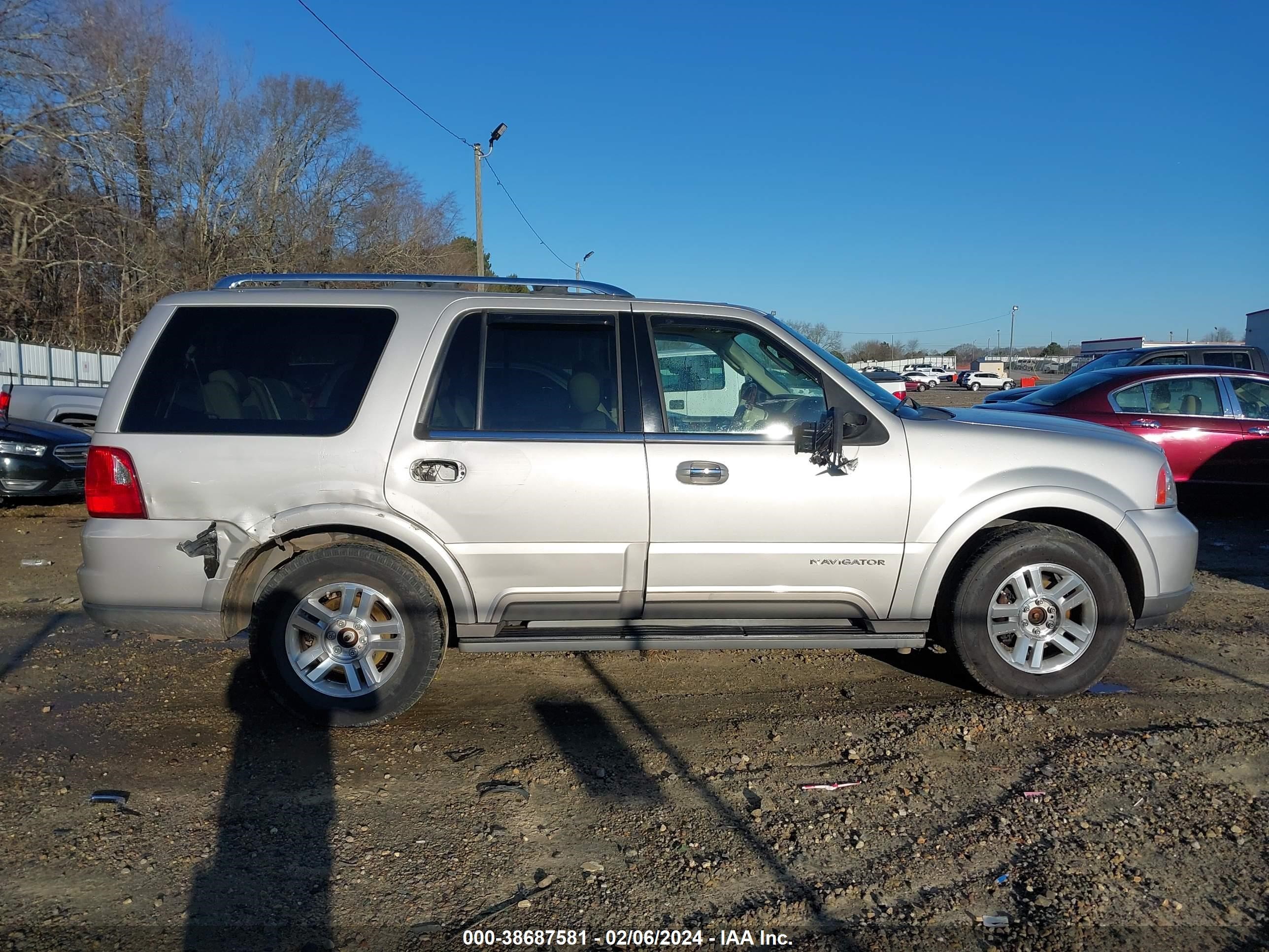 Photo 12 VIN: 5LMFU28R94LJ02570 - LINCOLN NAVIGATOR 