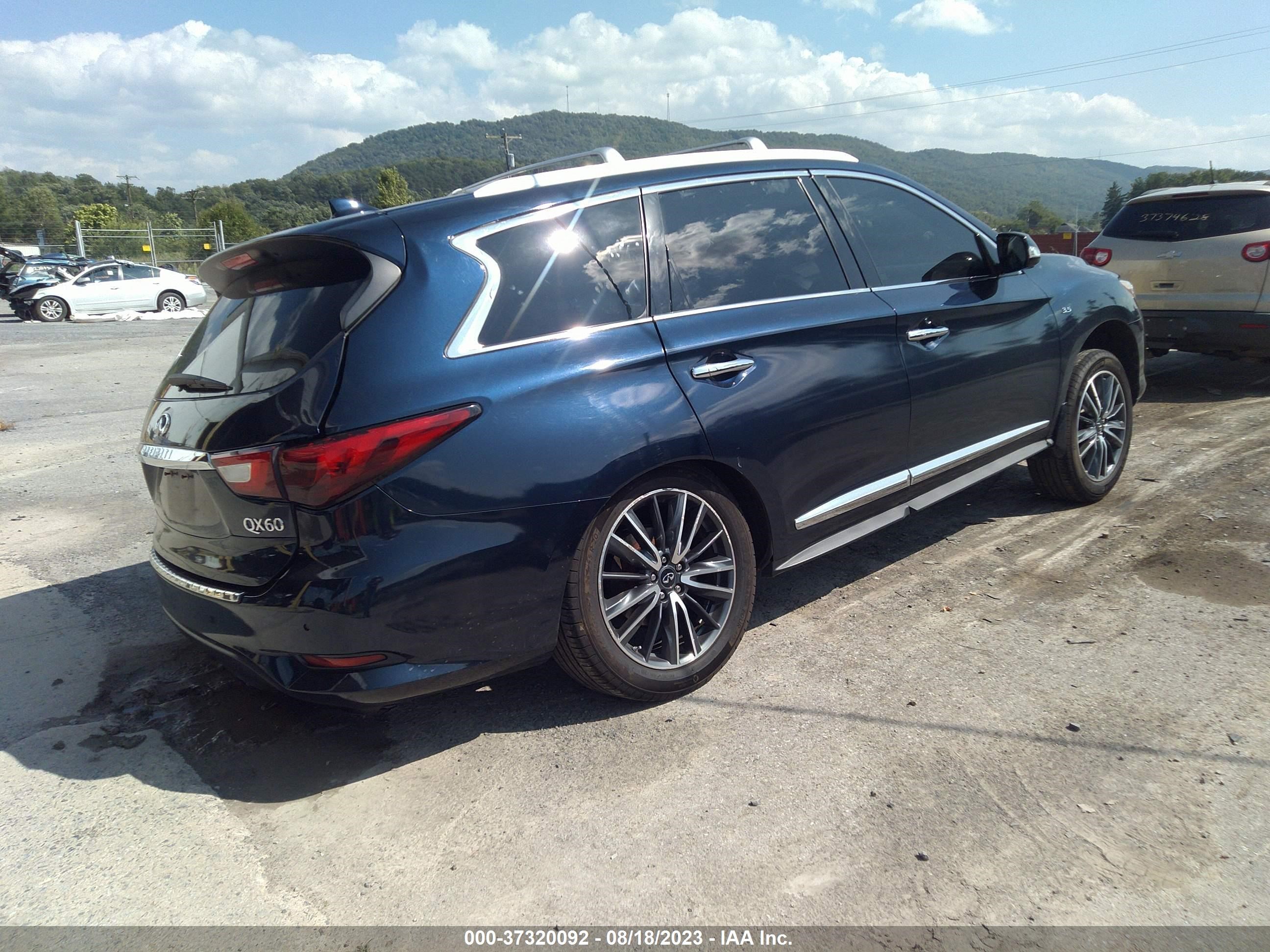 Photo 3 VIN: 5N1AL0MM6GC517705 - INFINITI QX60 