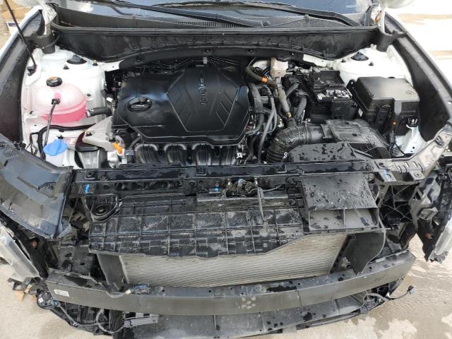 Photo 11 VIN: 5NMJA3AE5PH280876 - HYUNDAI TUCSON SE 