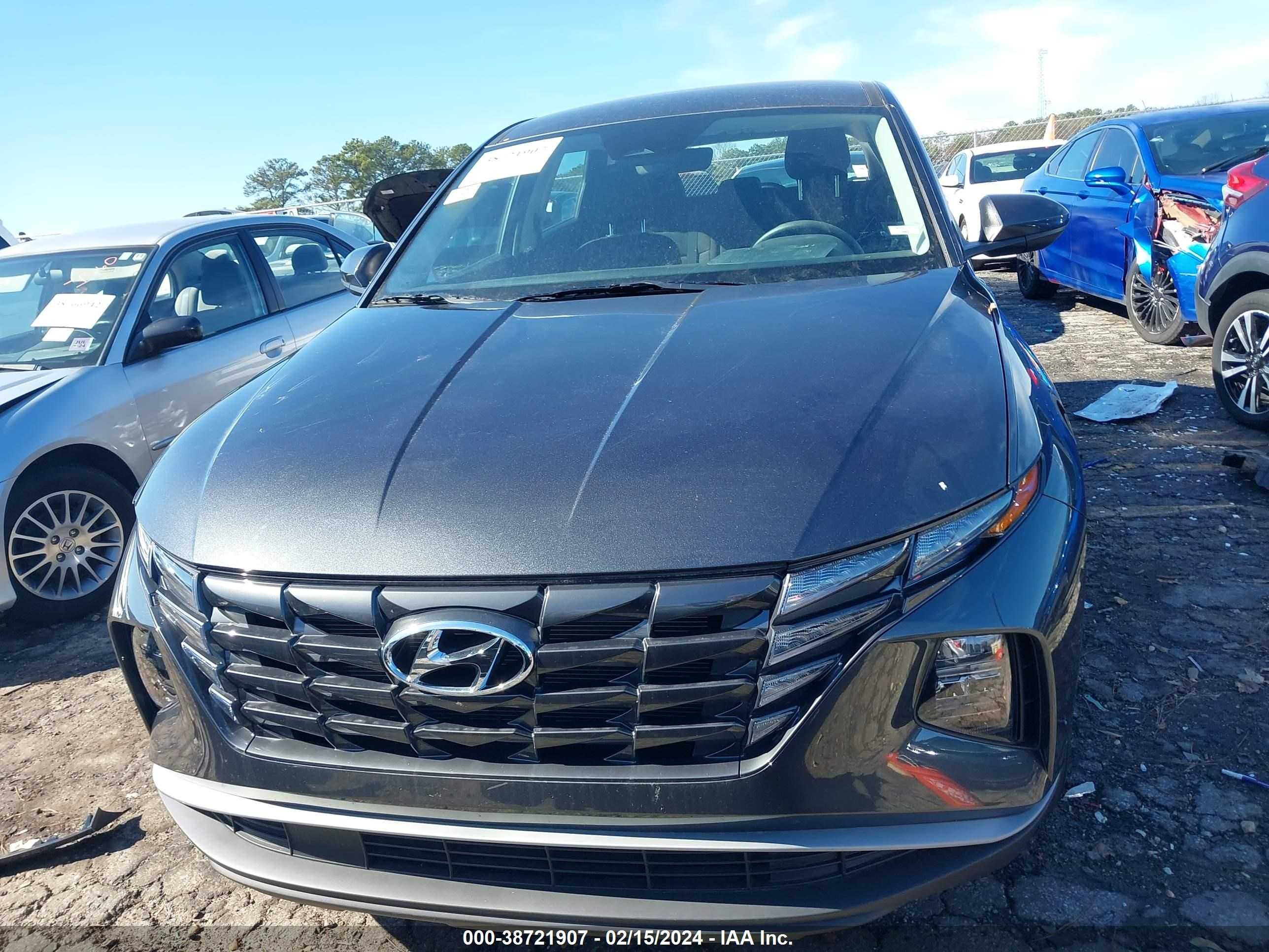 Photo 12 VIN: 5NMJA3AE6PH245005 - HYUNDAI TUCSON 