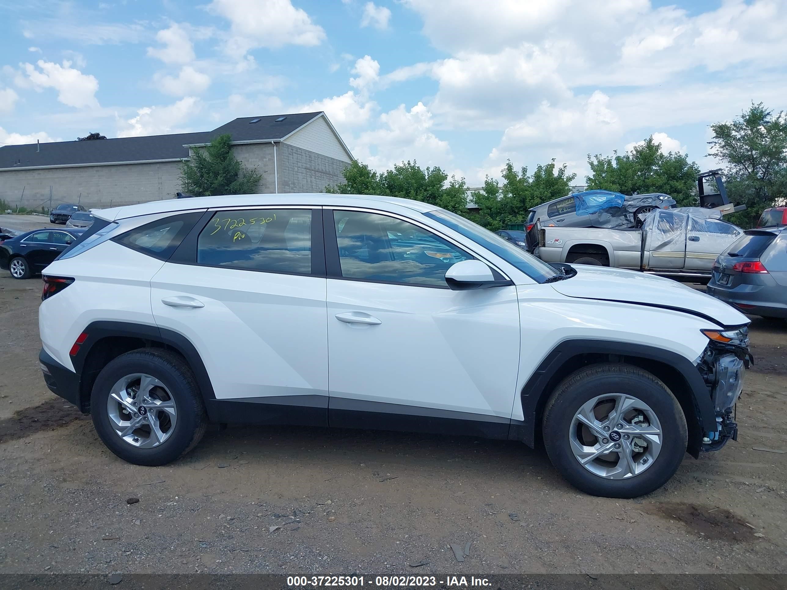 Photo 12 VIN: 5NMJACAE2PH234180 - HYUNDAI TUCSON 