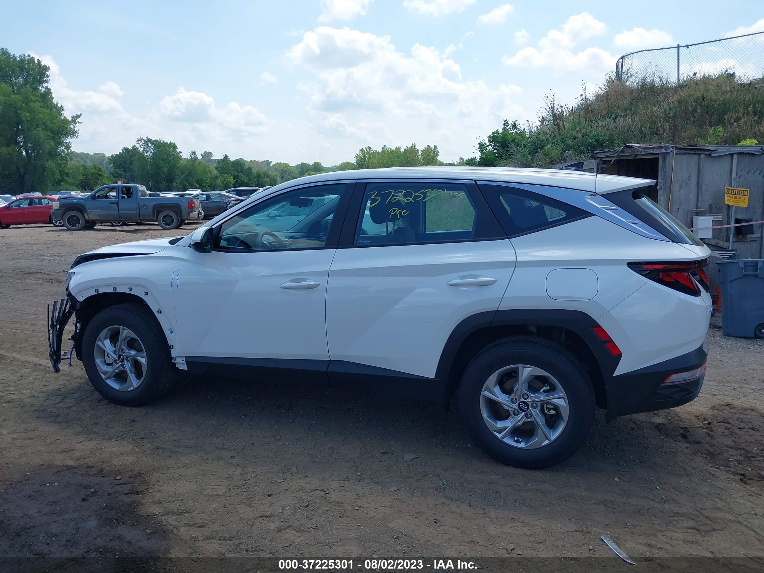 Photo 13 VIN: 5NMJACAE2PH234180 - HYUNDAI TUCSON 