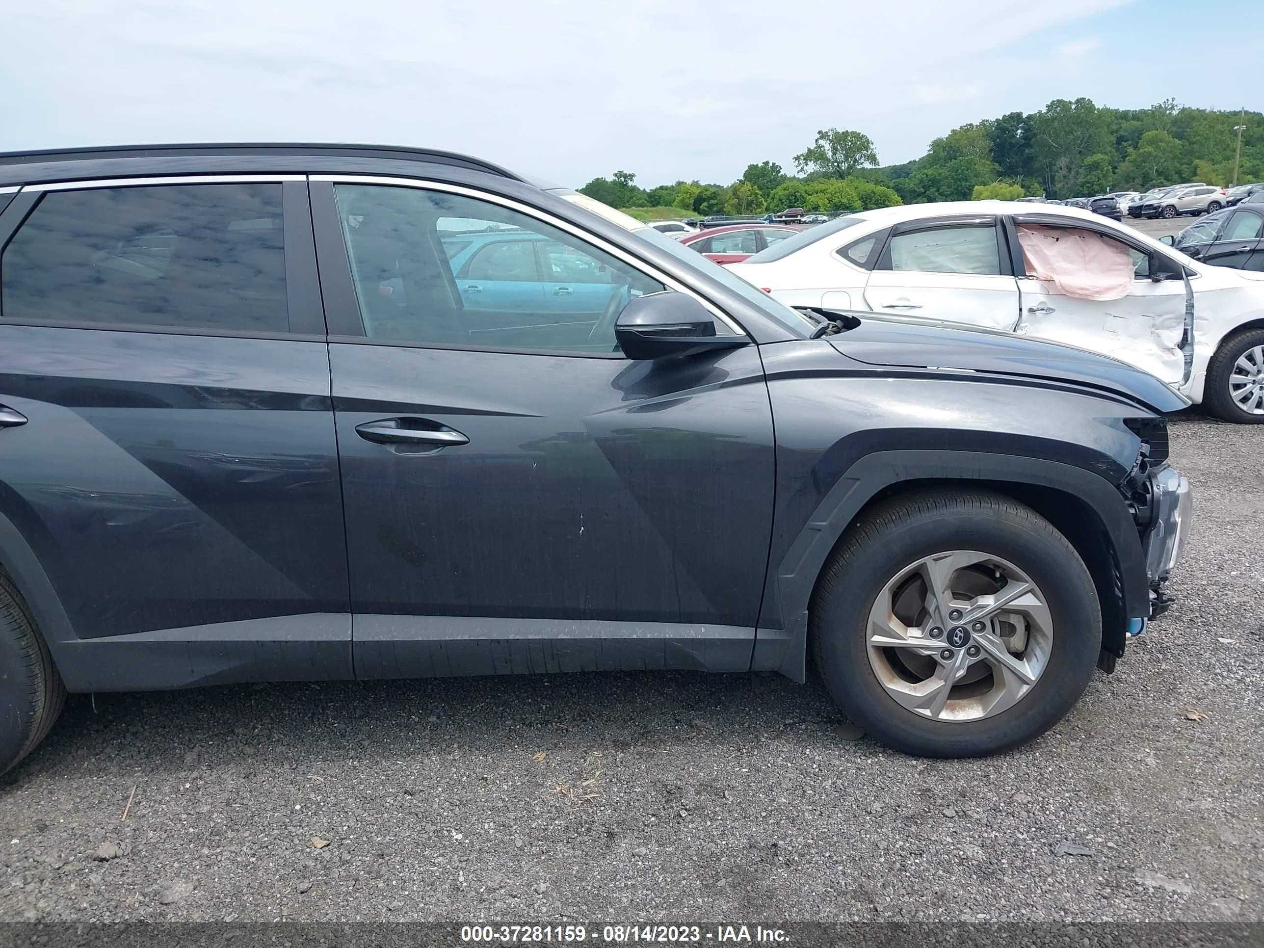 Photo 13 VIN: 5NMJB3AE3NH134437 - HYUNDAI TUCSON 