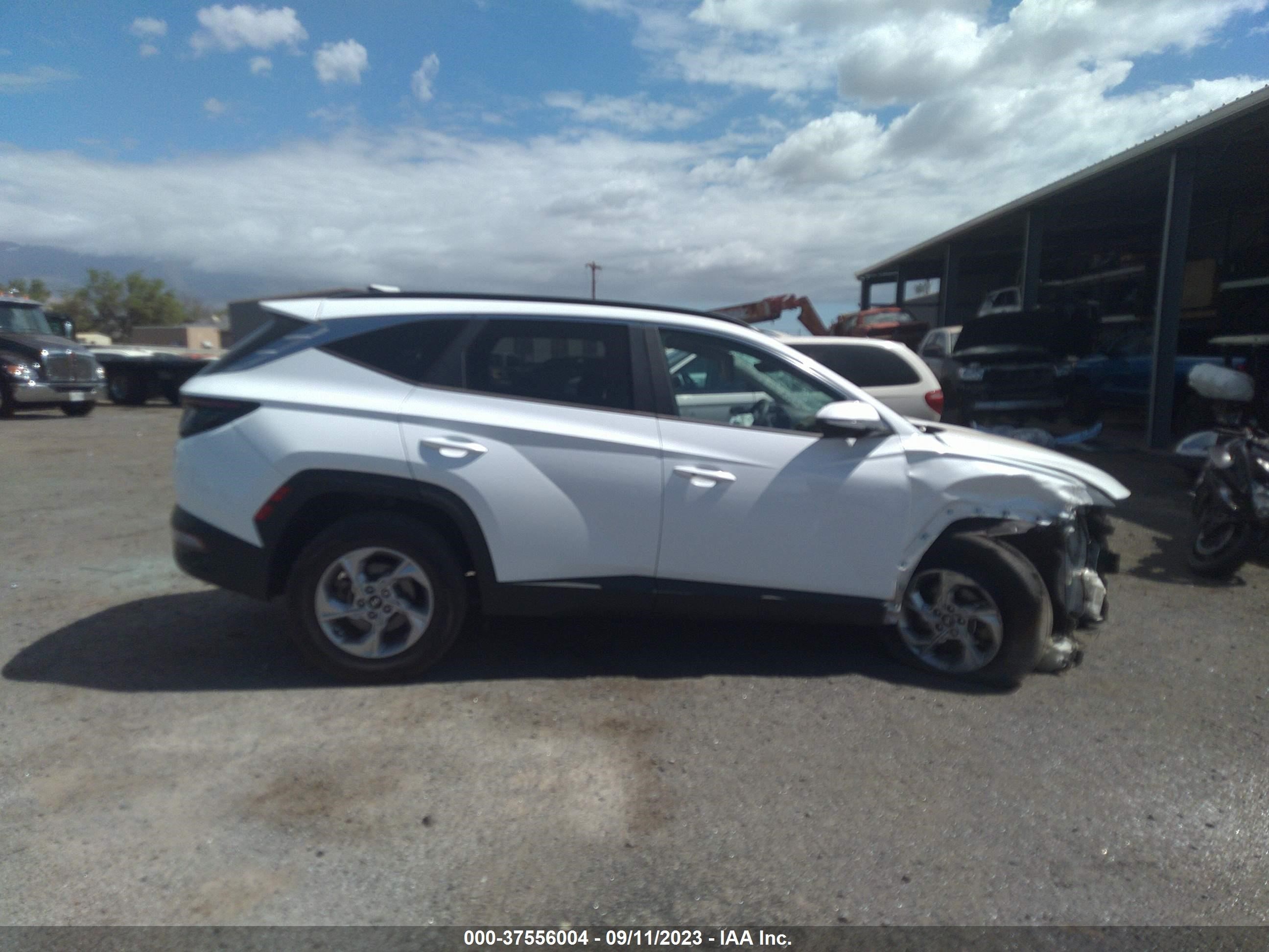 Photo 13 VIN: 5NMJB3AE6NH004300 - HYUNDAI TUCSON 