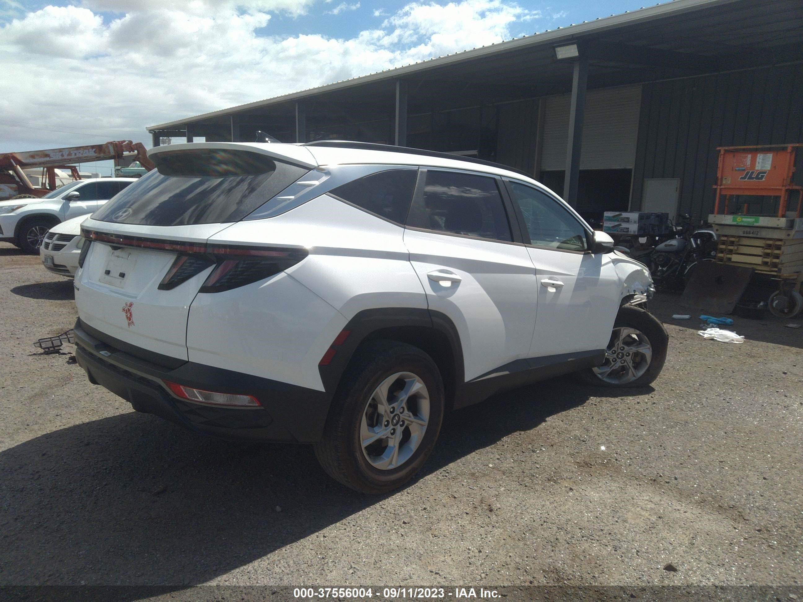 Photo 3 VIN: 5NMJB3AE6NH004300 - HYUNDAI TUCSON 