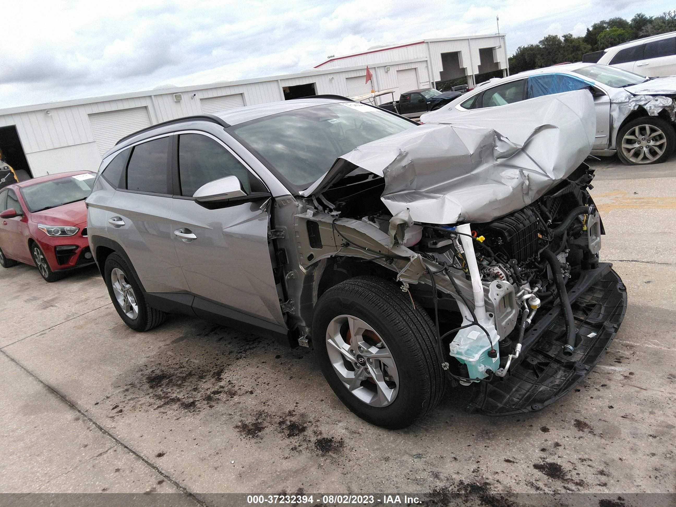 Photo 12 VIN: 5NMJB3AE9NH095594 - HYUNDAI TUCSON 