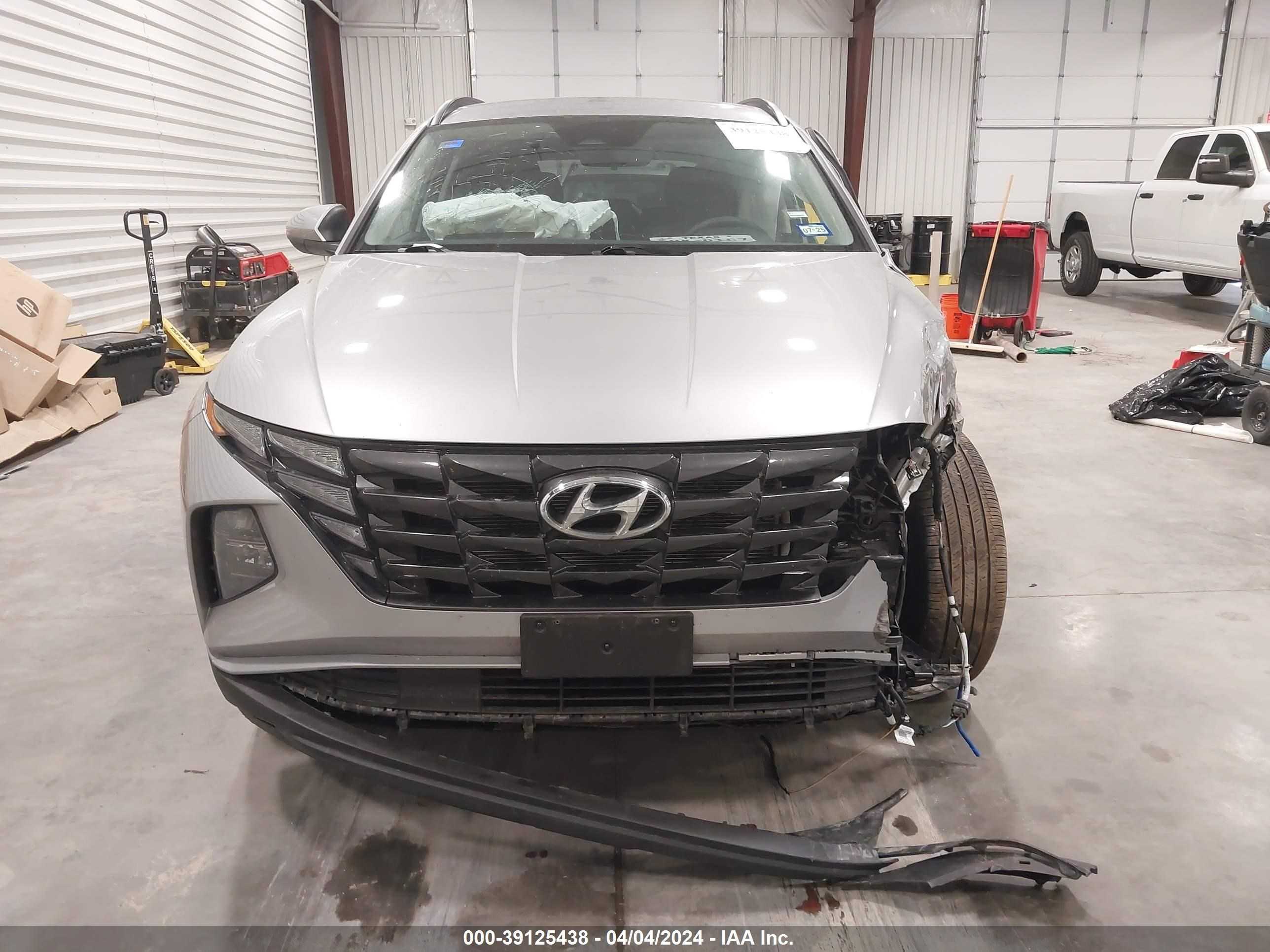 Photo 11 VIN: 5NMJB3DE6RH305568 - HYUNDAI TUCSON 