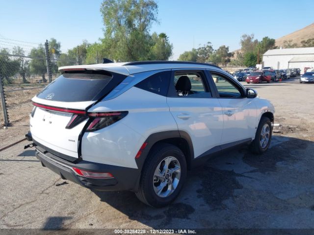 Photo 3 VIN: 5NMJBCAE2NH097820 - HYUNDAI TUCSON 