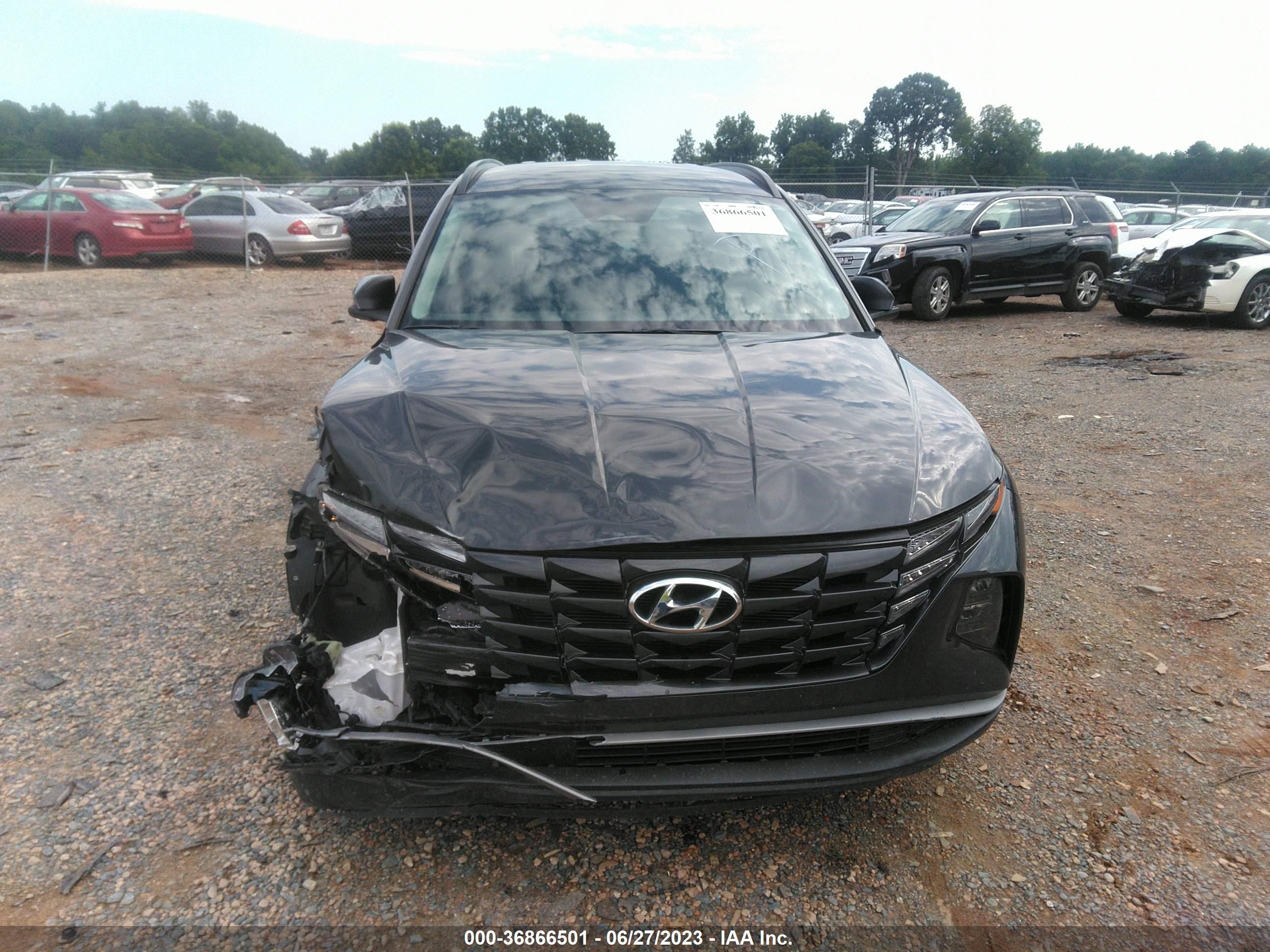 Photo 11 VIN: 5NMJBCAE7NH150205 - HYUNDAI TUCSON 