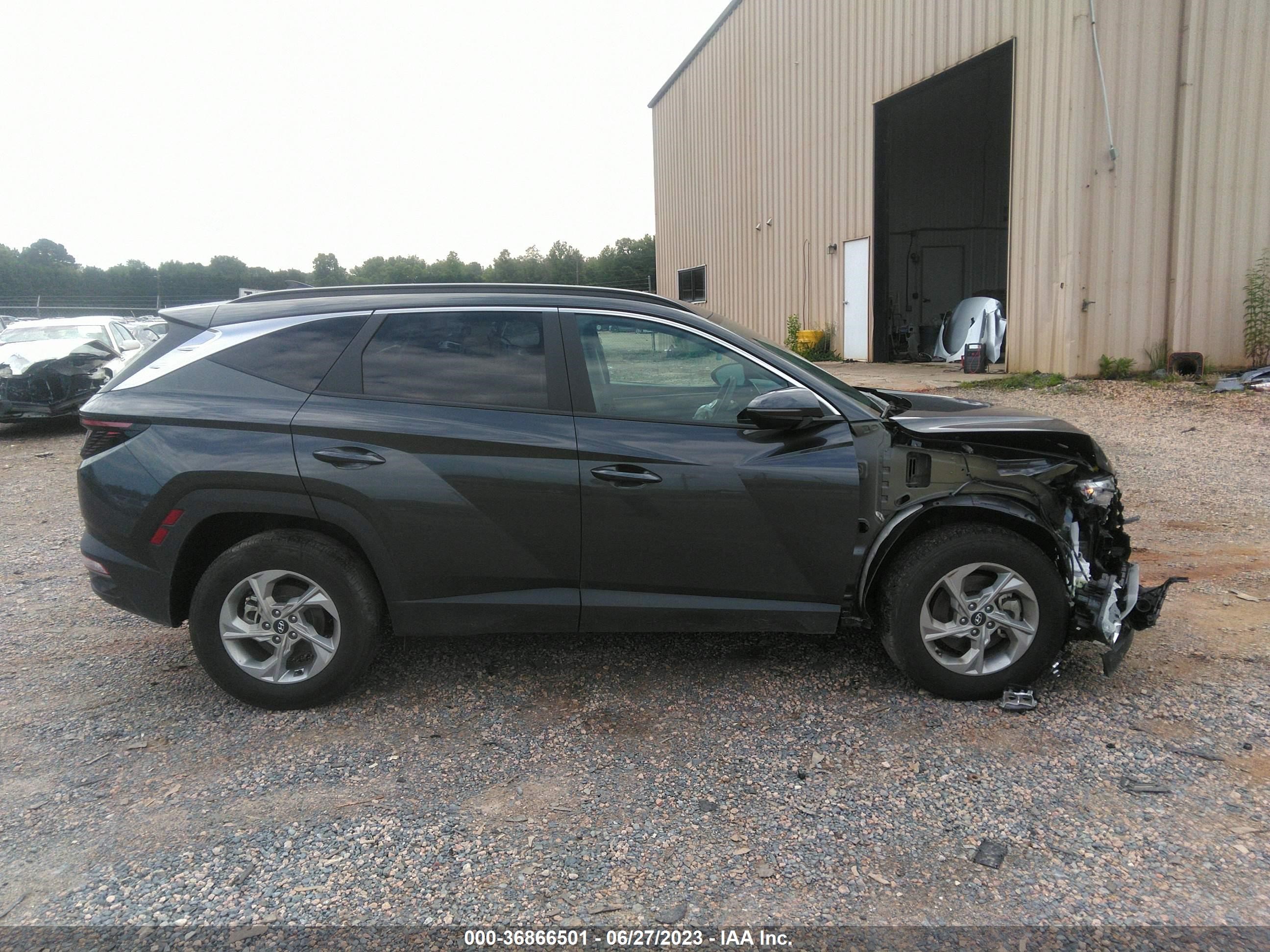 Photo 12 VIN: 5NMJBCAE7NH150205 - HYUNDAI TUCSON 