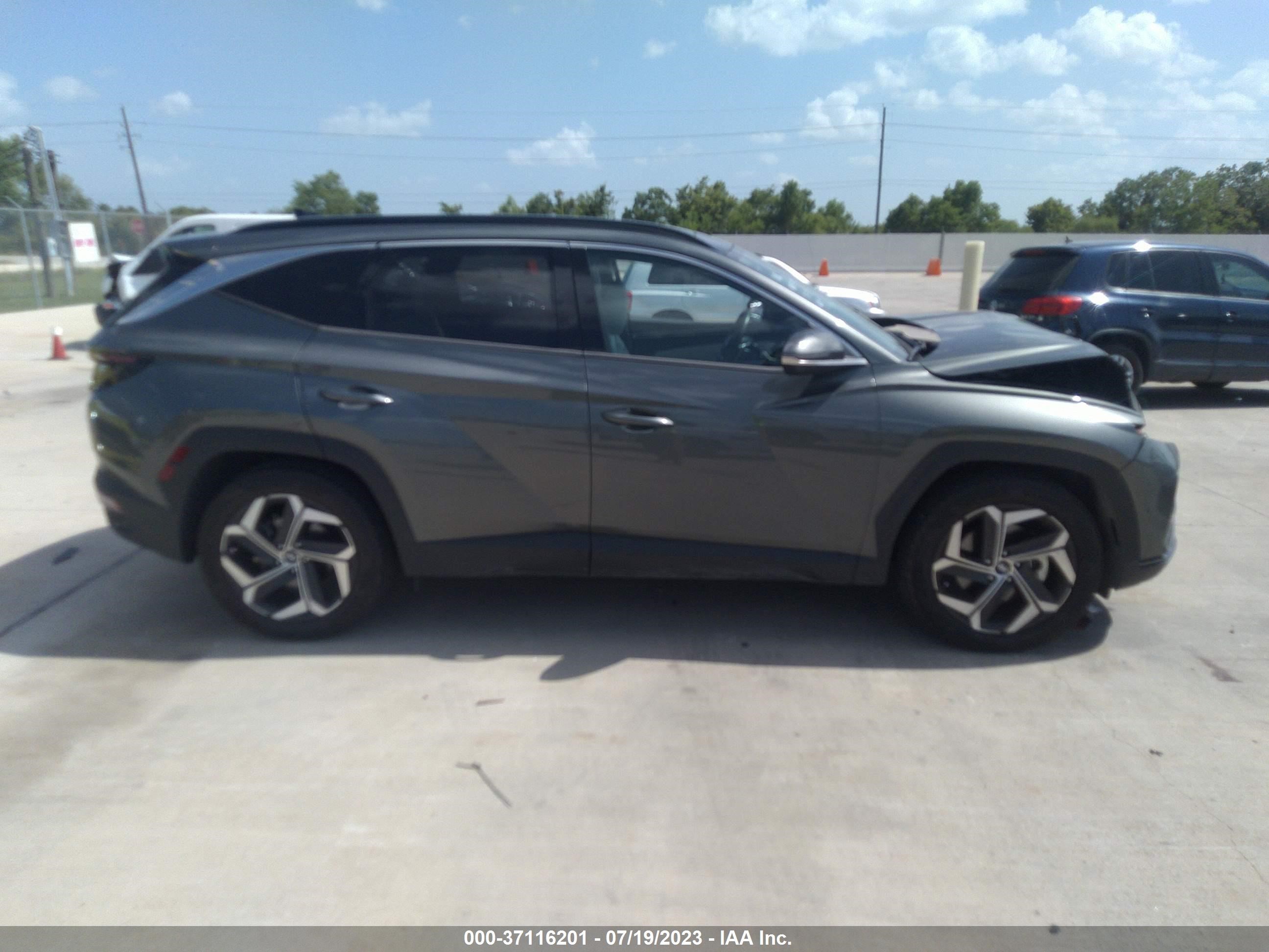 Photo 12 VIN: 5NMJE3AE6NH046425 - HYUNDAI TUCSON 