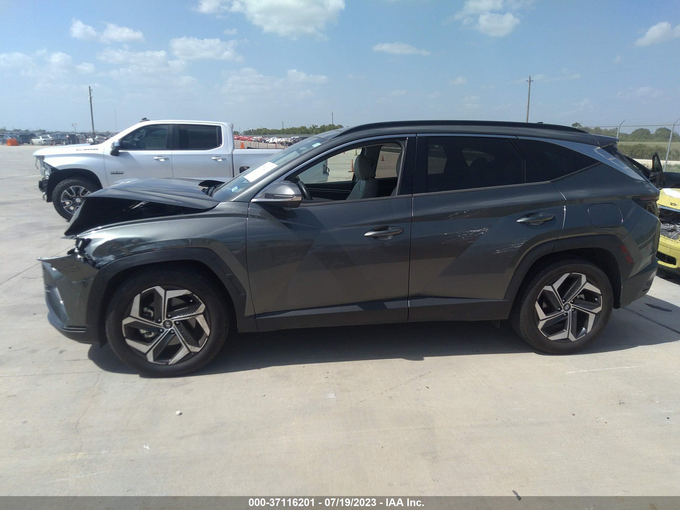 Photo 13 VIN: 5NMJE3AE6NH046425 - HYUNDAI TUCSON 