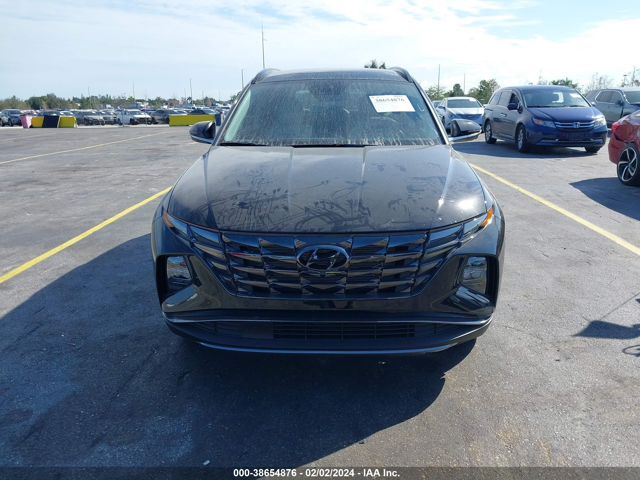 Photo 12 VIN: 5NMJE3DE9RH316989 - HYUNDAI TUCSON 