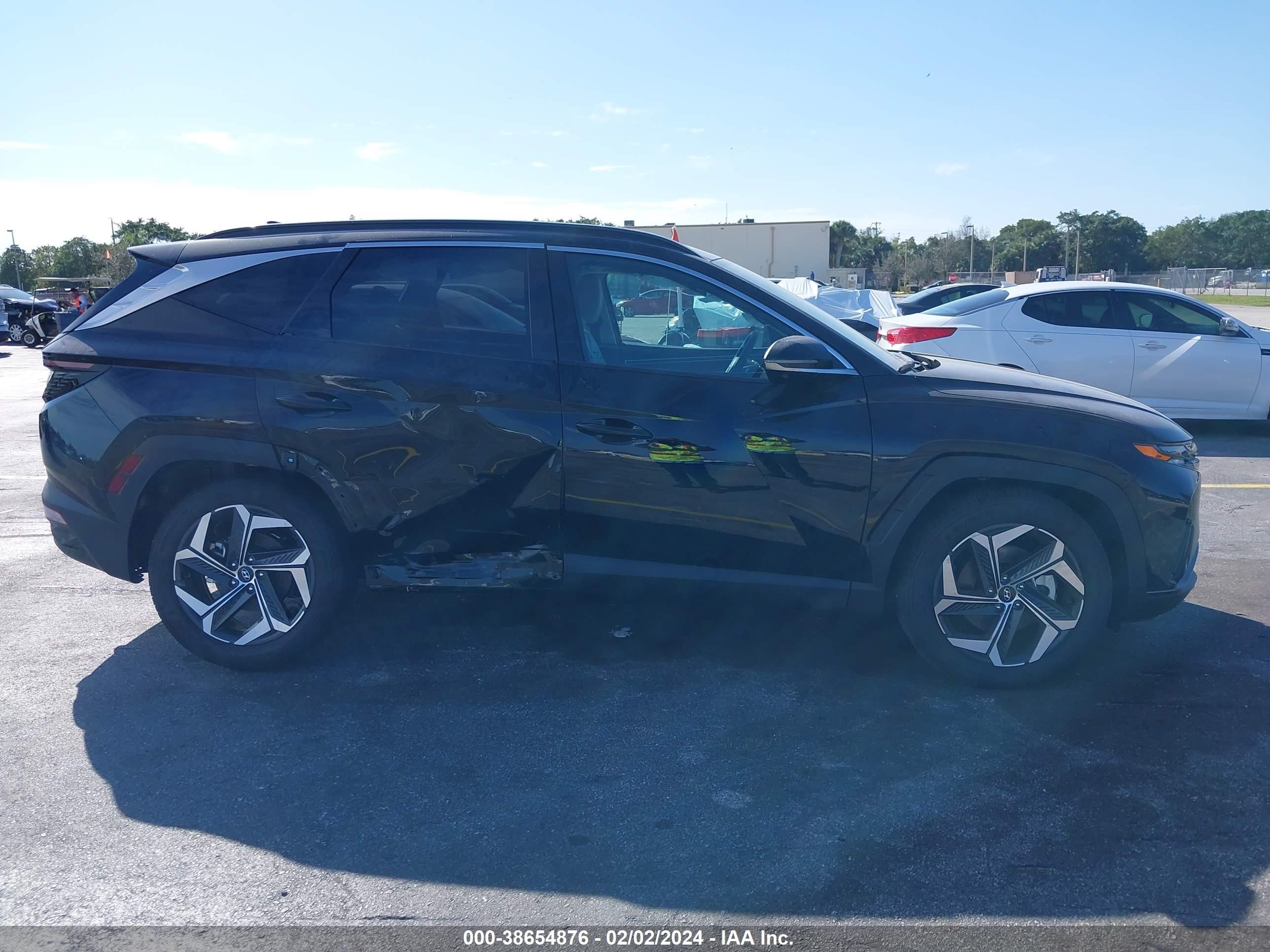 Photo 13 VIN: 5NMJE3DE9RH316989 - HYUNDAI TUCSON 