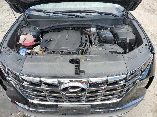 Photo 11 VIN: 5NMJECAE3PH186628 - HYUNDAI TUCSON LIM 