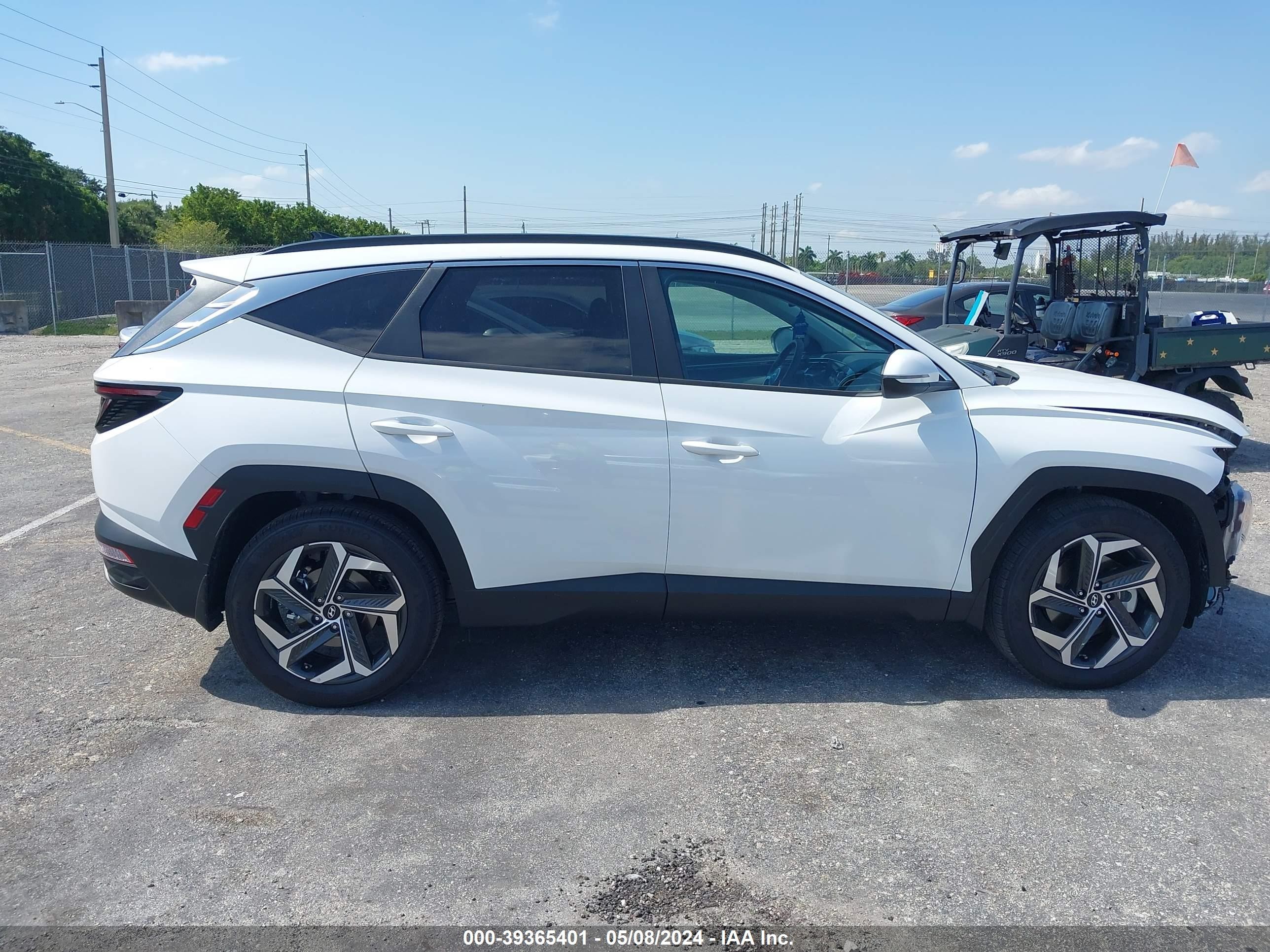 Photo 13 VIN: 5NMJF3DE2RH384578 - HYUNDAI TUCSON 