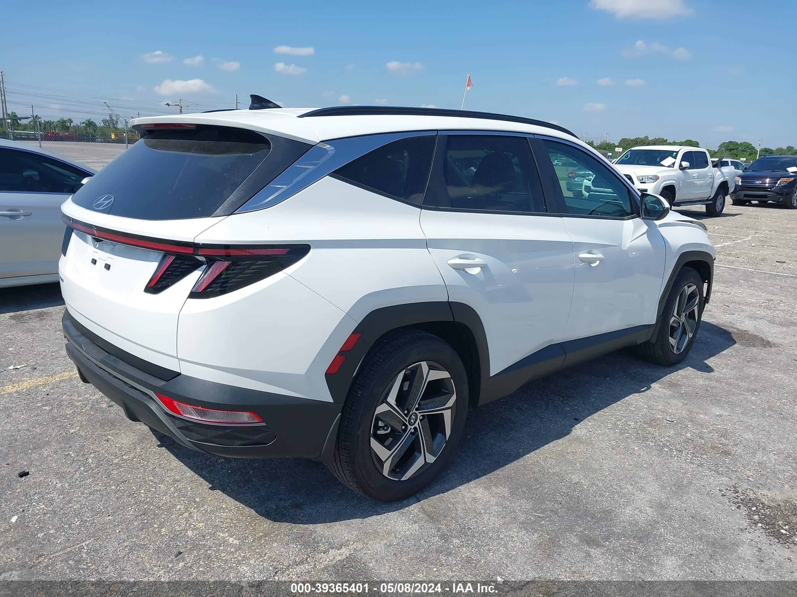 Photo 3 VIN: 5NMJF3DE2RH384578 - HYUNDAI TUCSON 