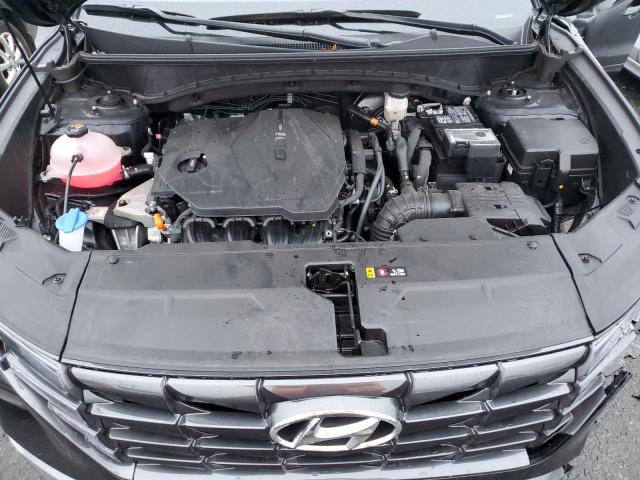 Photo 11 VIN: 5NMJFCAE0PH223521 - HYUNDAI TUCSON 