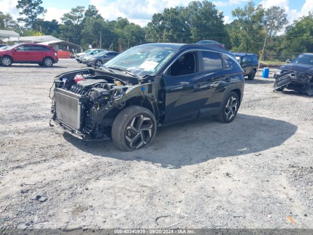 Photo 1 VIN: 5NMJFCAE5NH128725 - HYUNDAI TUCSON 