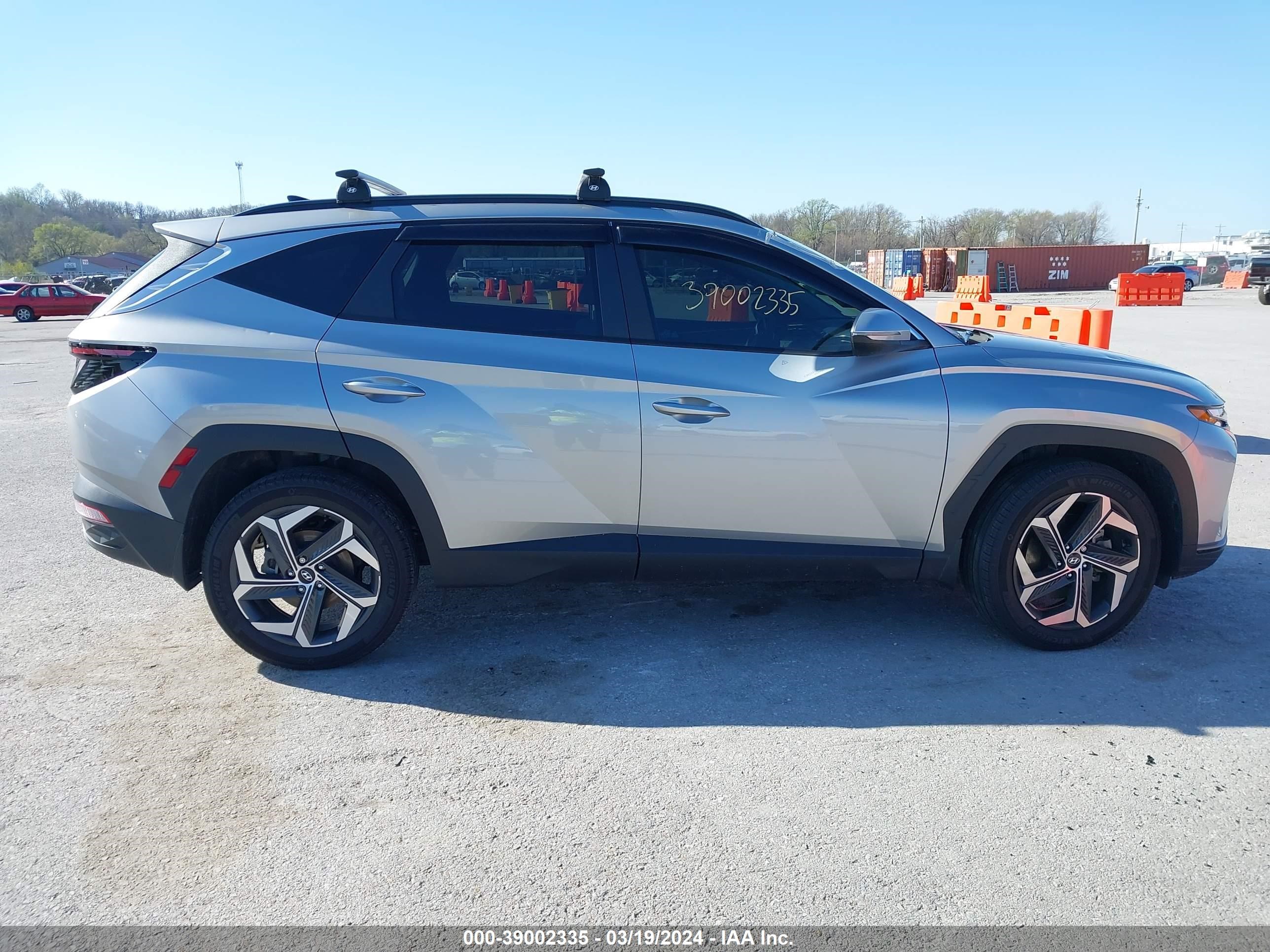 Photo 12 VIN: 5NMJFCAE5PH163512 - HYUNDAI TUCSON 