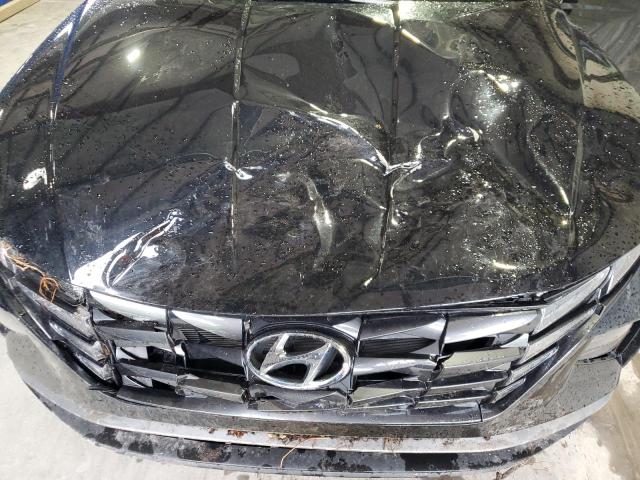 Photo 11 VIN: 5NMJFCAE9PH272331 - HYUNDAI TUCSON 