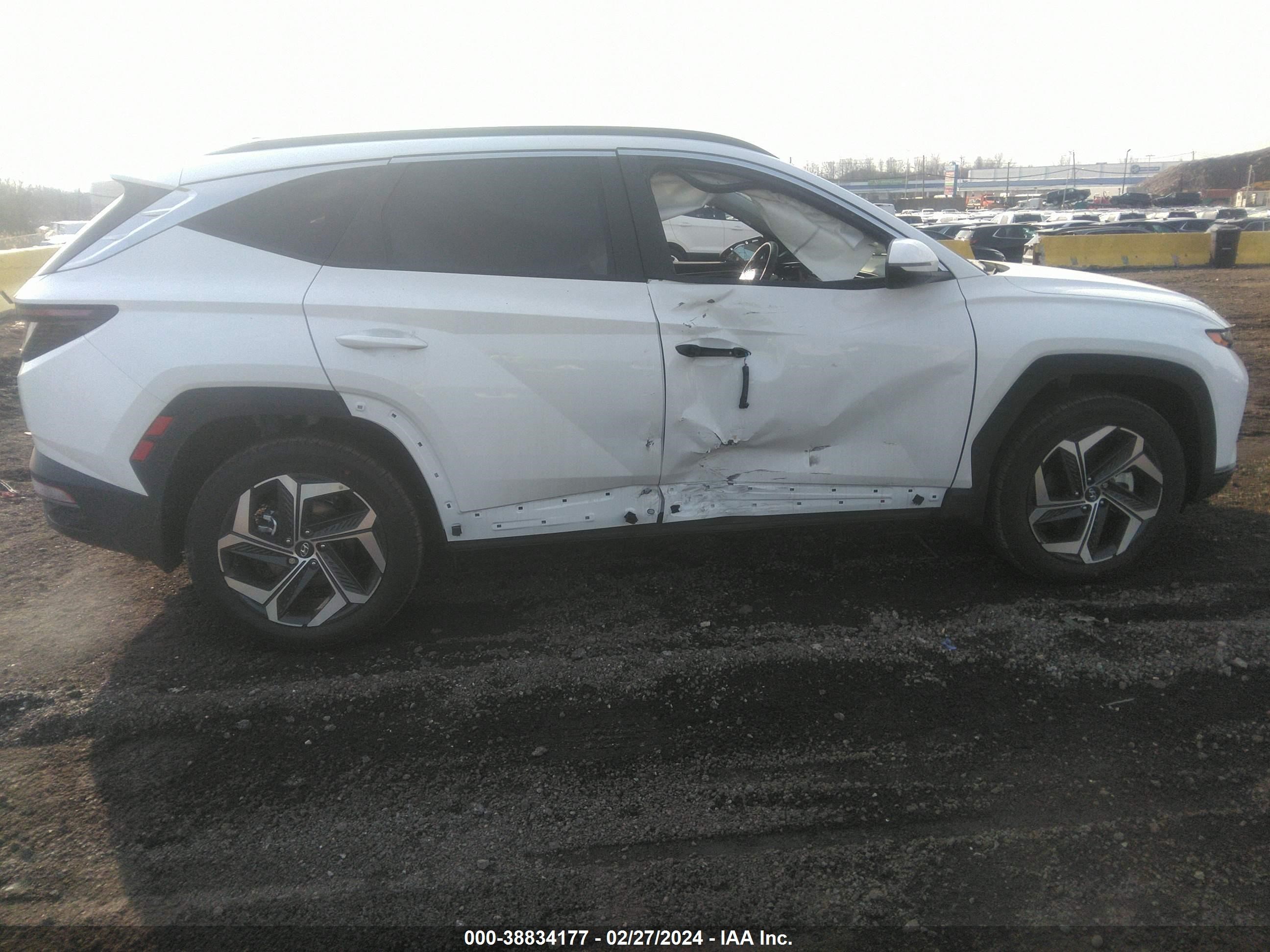 Photo 12 VIN: 5NMJFCDE0RH359114 - HYUNDAI TUCSON 