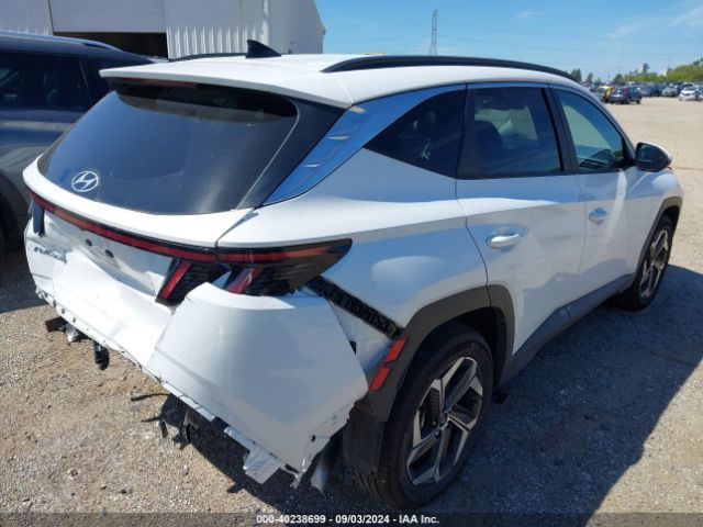 Photo 3 VIN: 5NMJFCDE4RH314628 - HYUNDAI TUCSON 