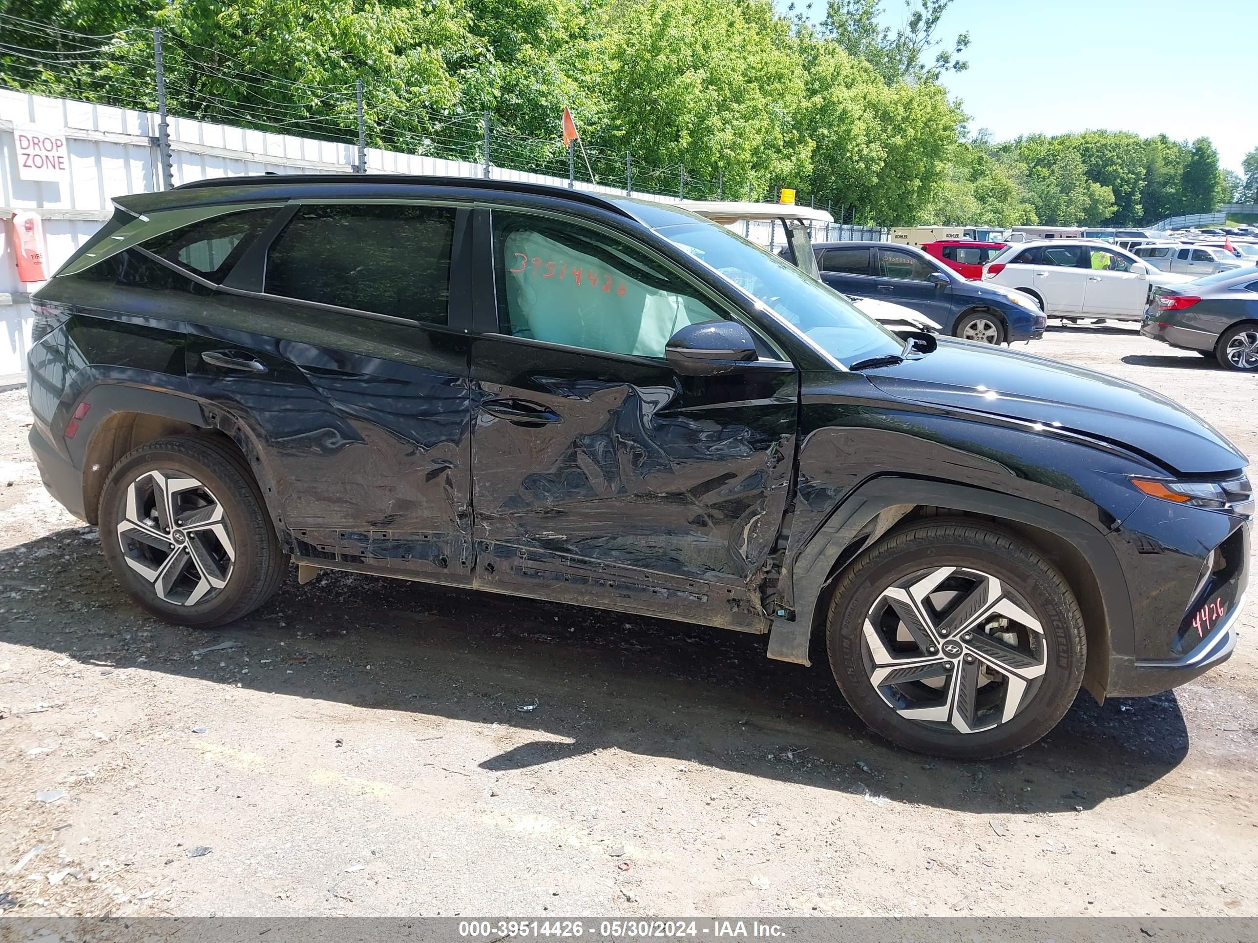 Photo 12 VIN: 5NMJFCDE5RH326206 - HYUNDAI TUCSON 