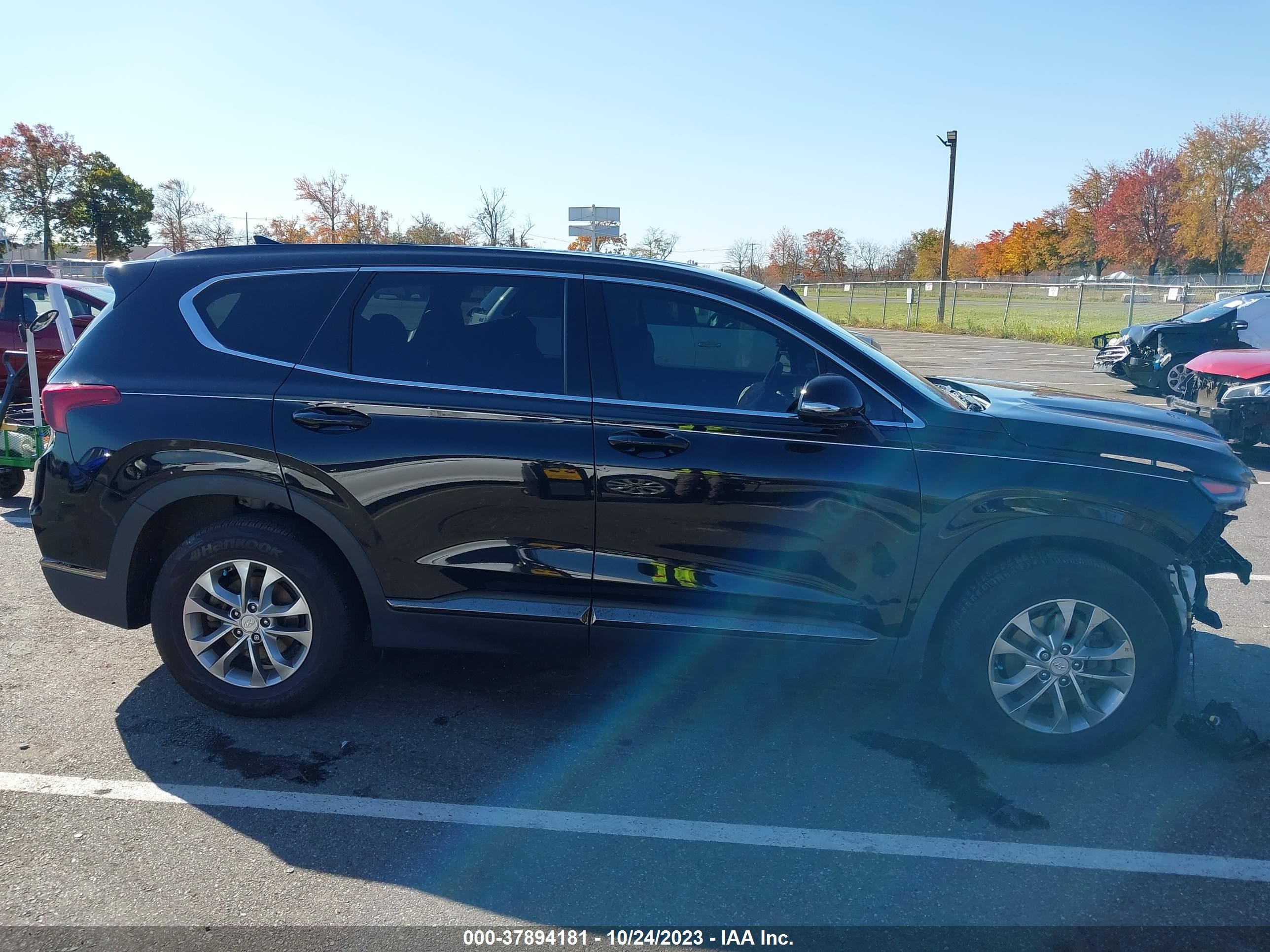 Photo 12 VIN: 5NMS3CAD0KH011067 - HYUNDAI SANTA FE 