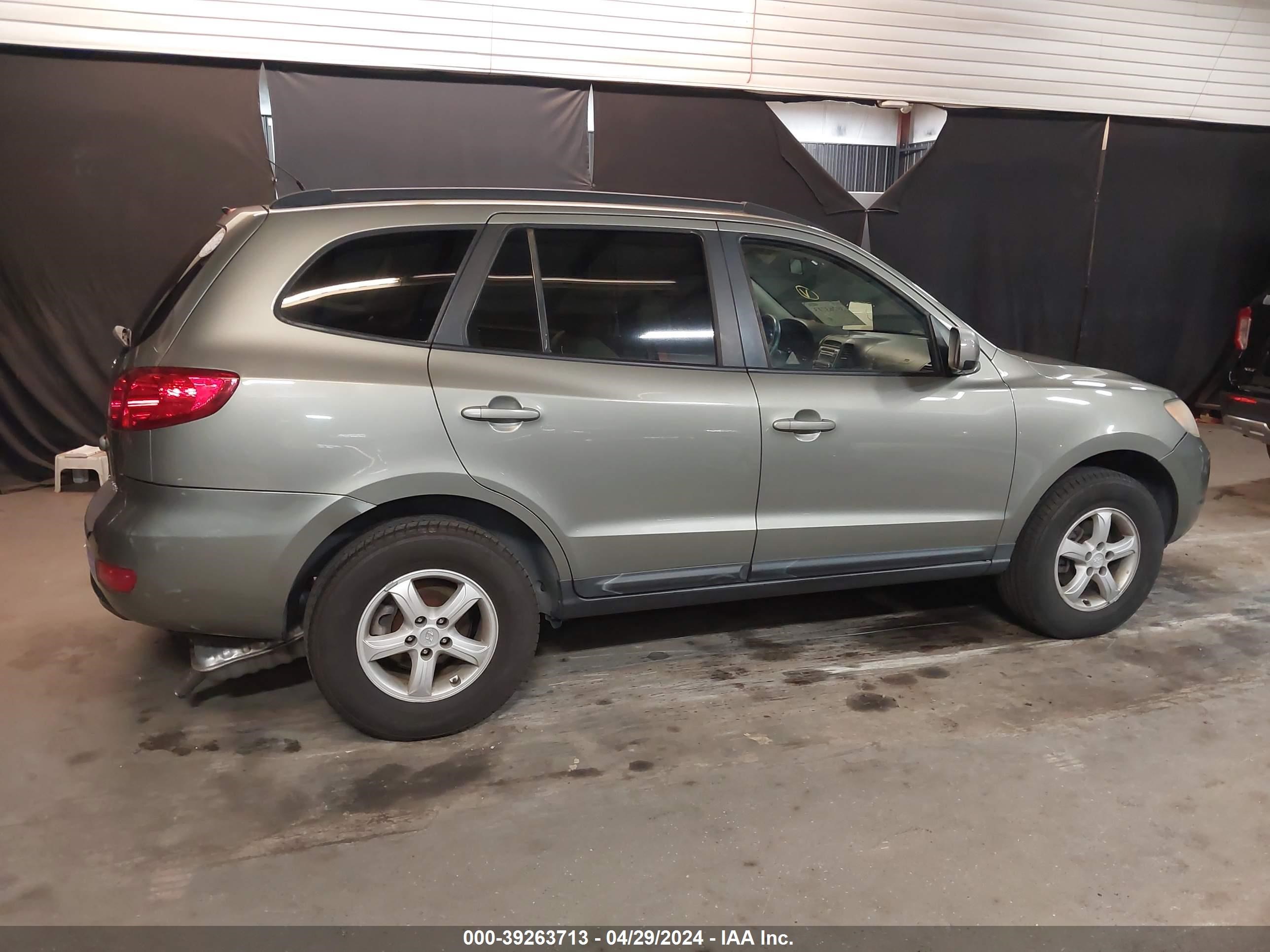 Photo 12 VIN: 5NMSG13D58H141411 - HYUNDAI SANTA FE 