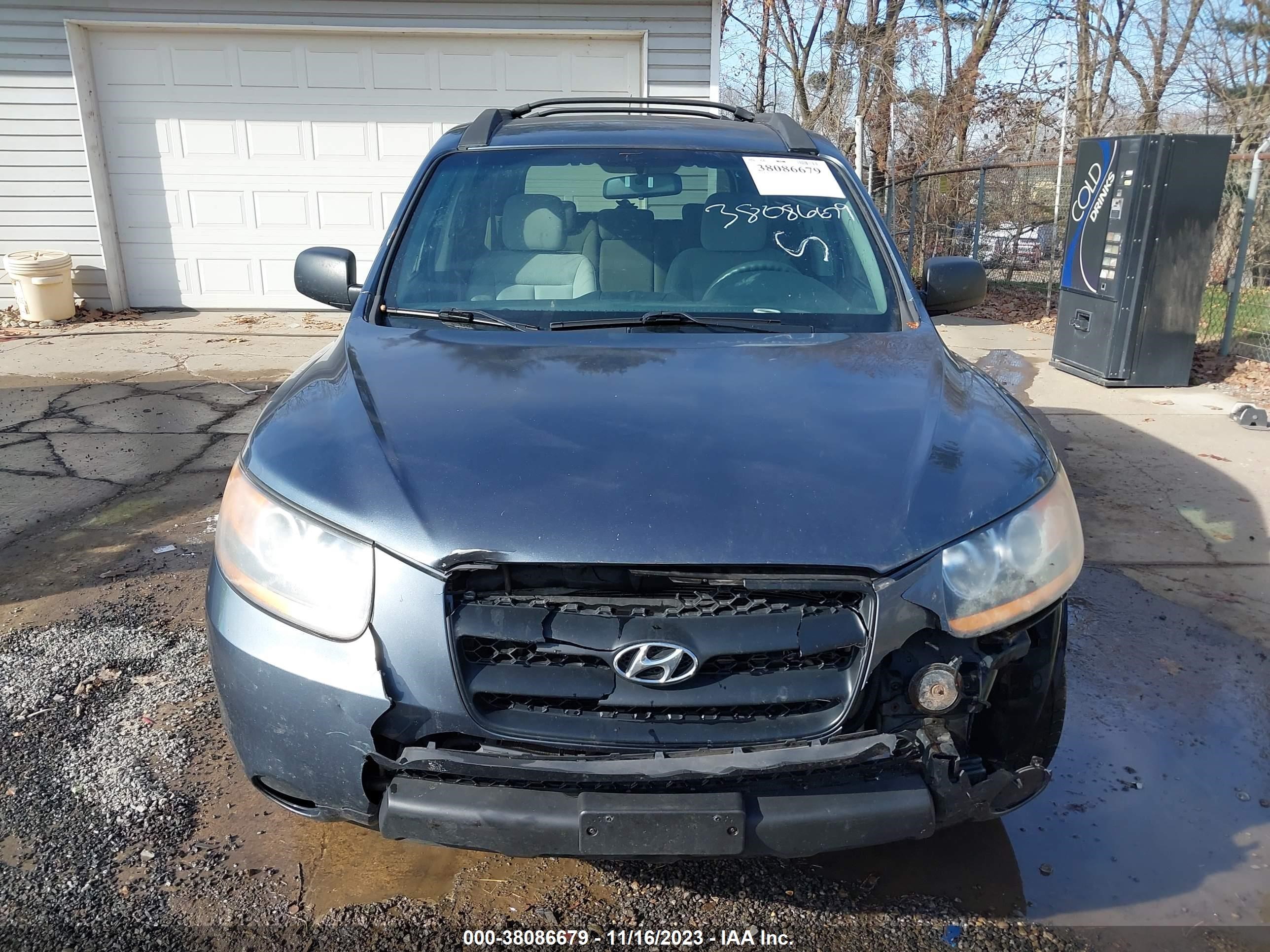 Photo 12 VIN: 5NMSG13D79H270672 - HYUNDAI SANTA FE 