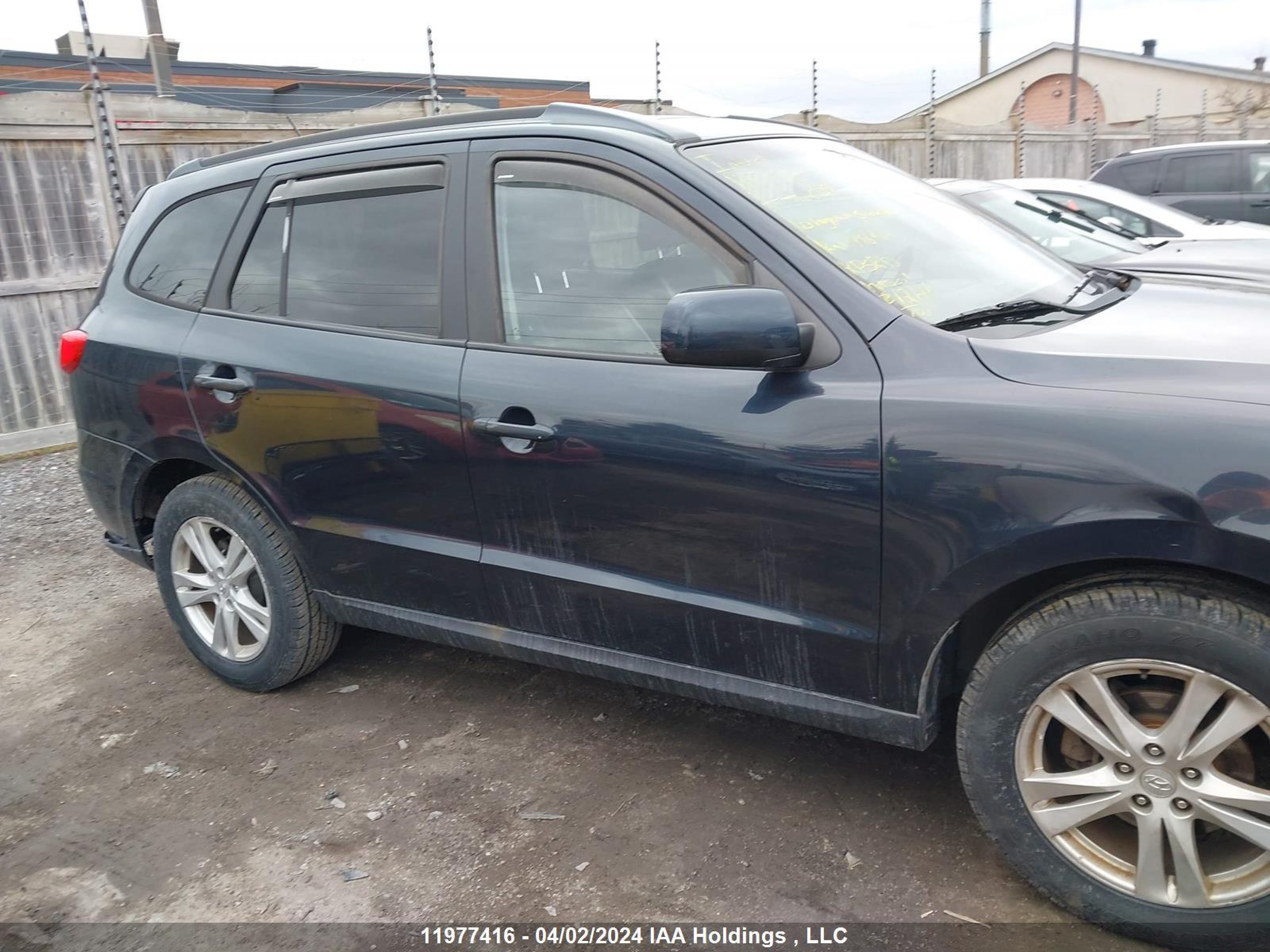 Photo 12 VIN: 5NMSG4AG2AH400859 - HYUNDAI SANTA FE 