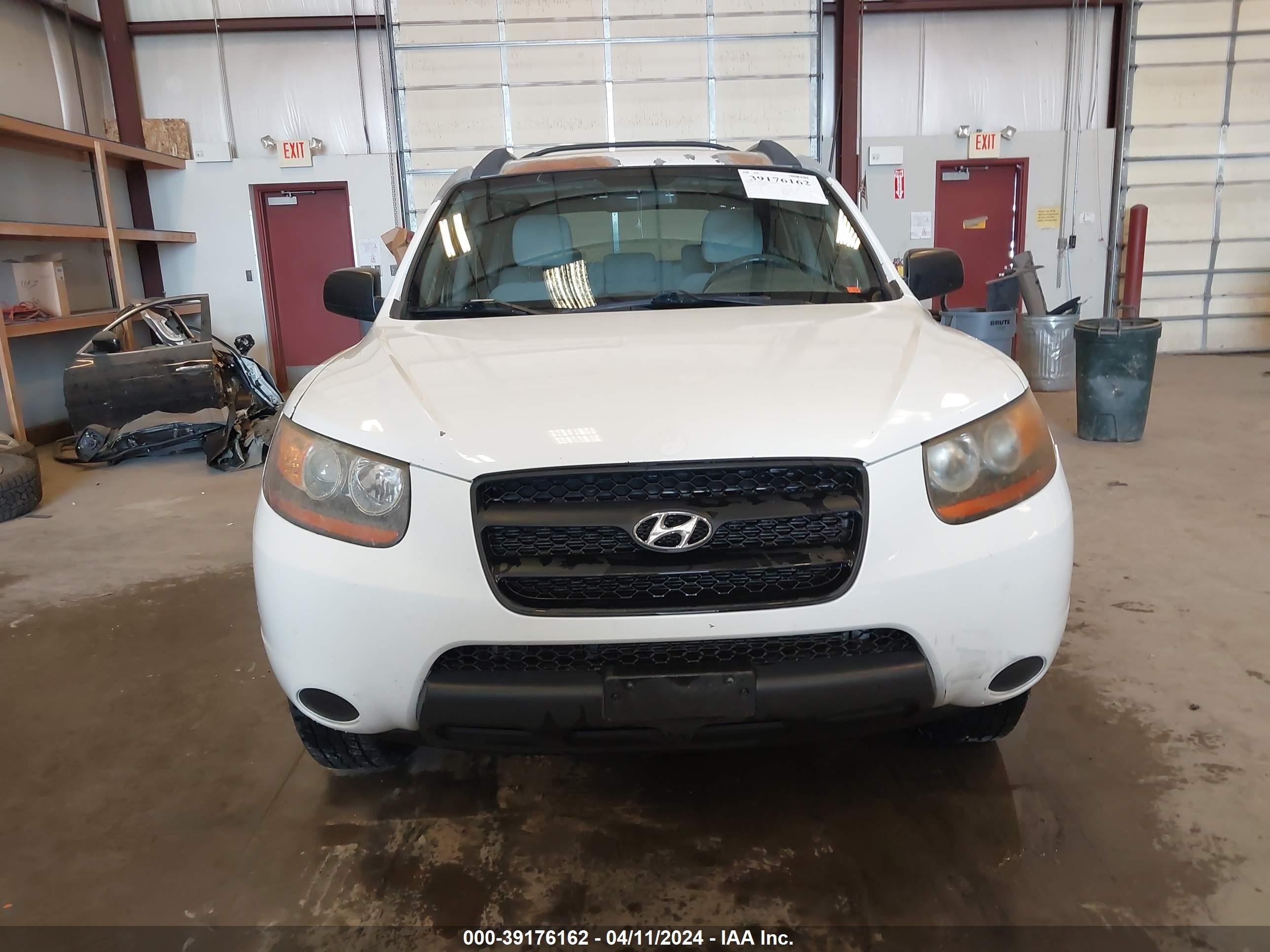 Photo 11 VIN: 5NMSG73D89H303617 - HYUNDAI SANTA FE 