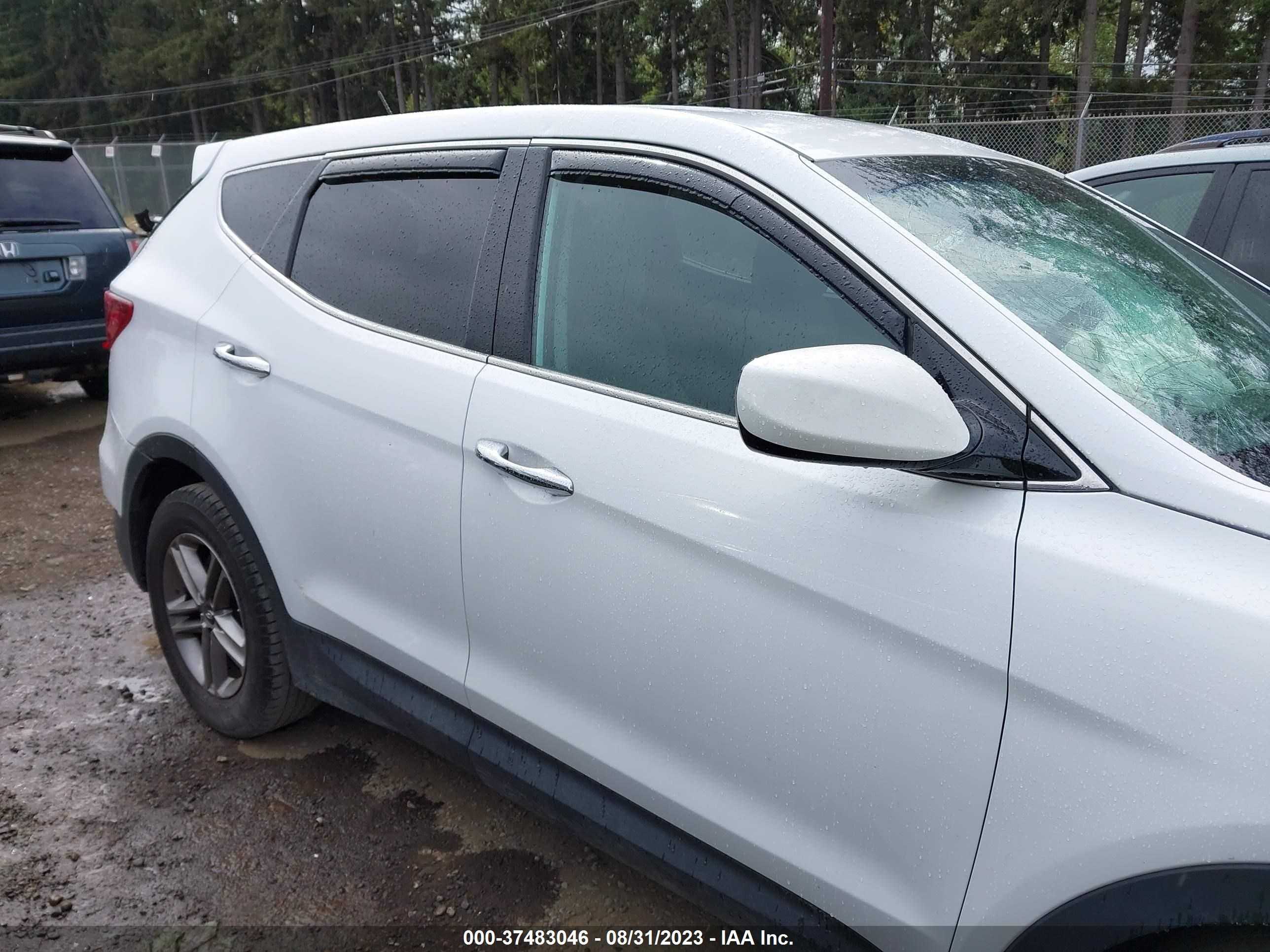 Photo 12 VIN: 5NMZT3LB9JH067274 - HYUNDAI SANTA FE SPORT 