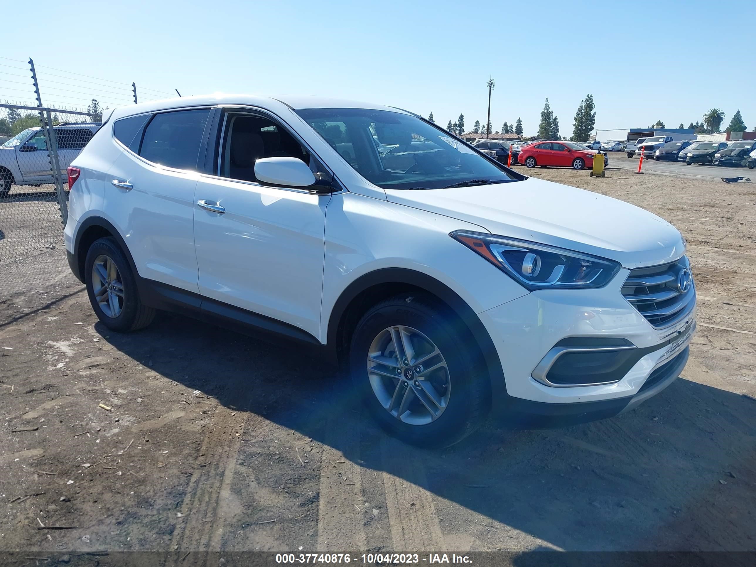 Photo 12 VIN: 5NMZTDLB1JH094877 - HYUNDAI SANTA FE 