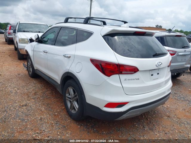 Photo 2 VIN: 5NMZU3LB2JH103450 - HYUNDAI SANTA FE SPORT 